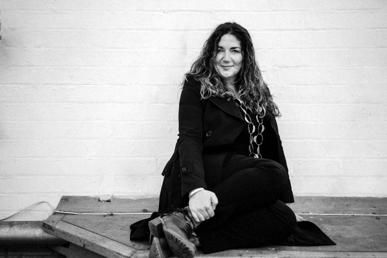 Sara-Colman-Jazz-Singer-British-Female-sitting-smiling.jpg
