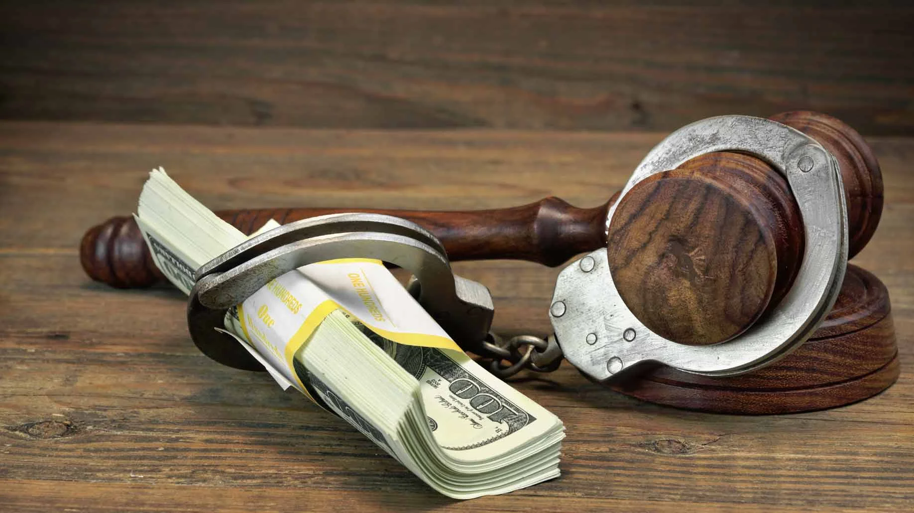 cash-handcuffed-to-gavel.jpg