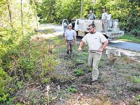Walkers, runners and bikers on the Ararat River Greenway Wednesday afternoon may have been surprised to see a truck using the same path. Workers accompanying the hatchery truck were stocking the river with trout.