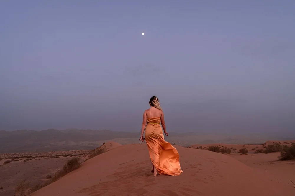 When desert sunset meets sand storm&hellip; magic is formed 🌚

Model @alexa.zosim123 🔥
Location 📍 Wadi Araba, Jordan 
BTS photo, dress design and desert driving @why_not_a_guide_in_jordan 🤪🎥✂️ my husband is alarmingly good at all the stuff.