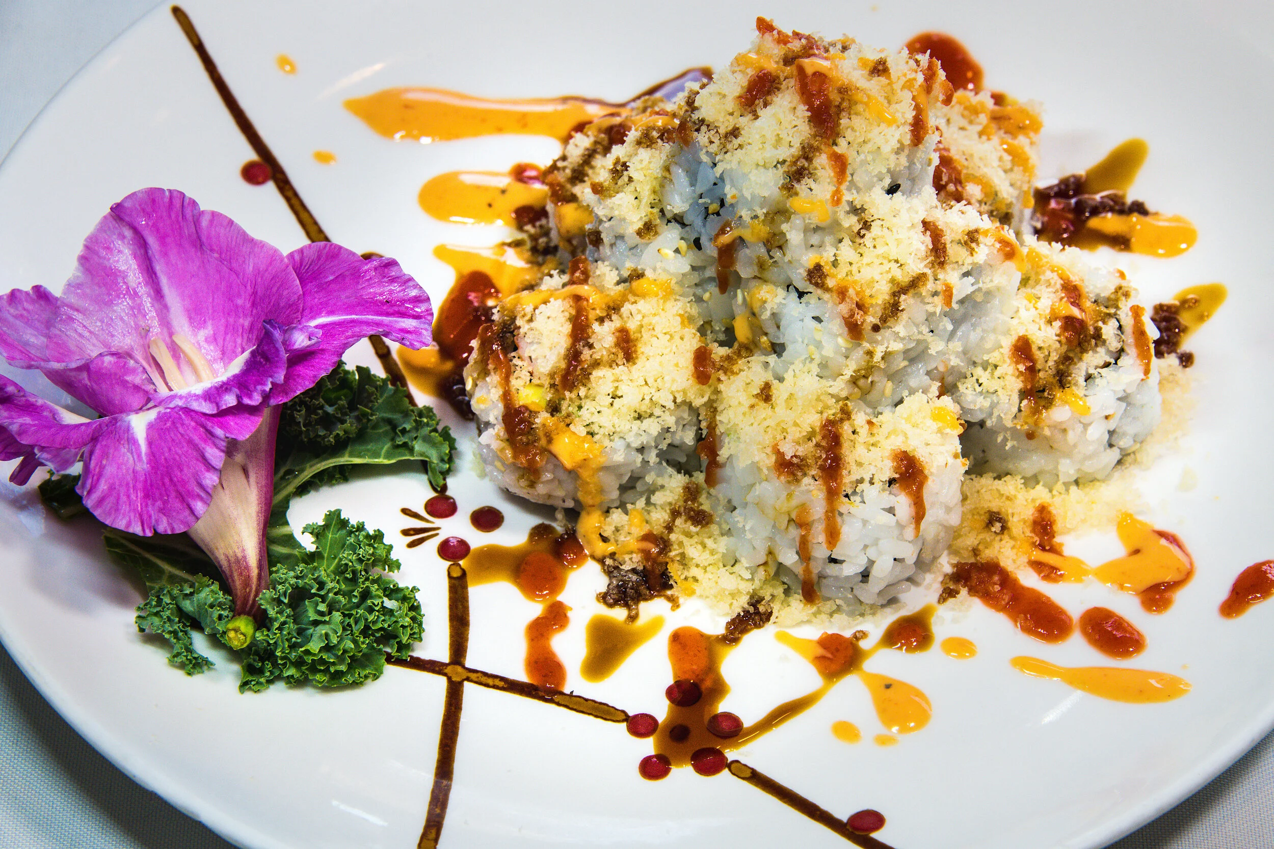 Volcano Roll (8) $9.99 Crab Meat Avocado Topped w Tempura Flake & Spicy Sauce