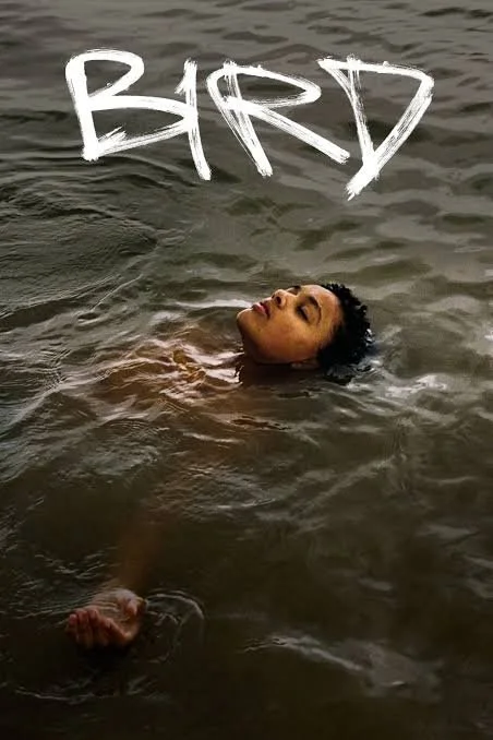 Bird, Andrea Arnold, (2024). film poster. person floating on their back in water. all but face submerged.