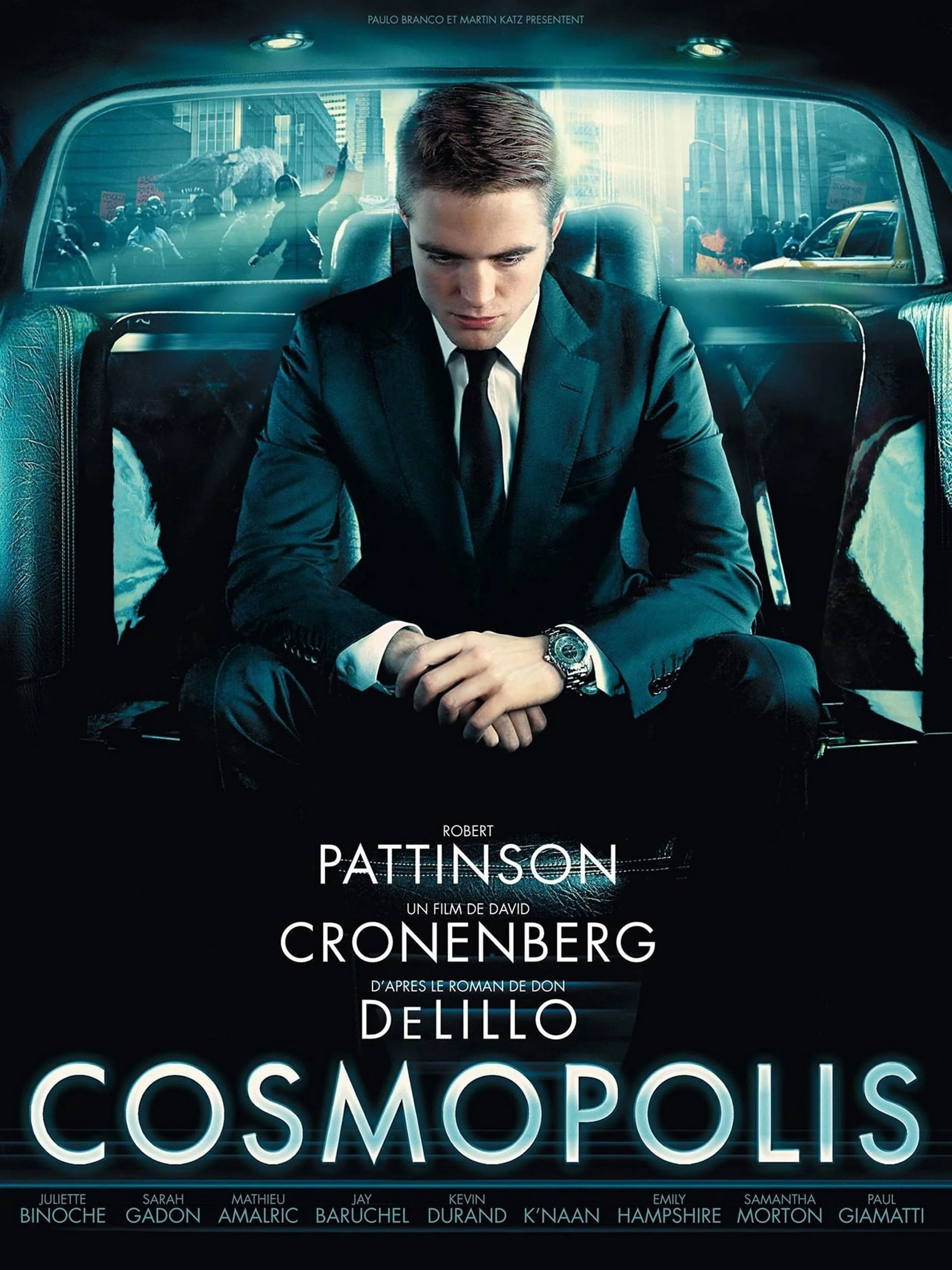 Cosmopolis, David Cronenberg, (2012). film poster. man in suit in back of car.