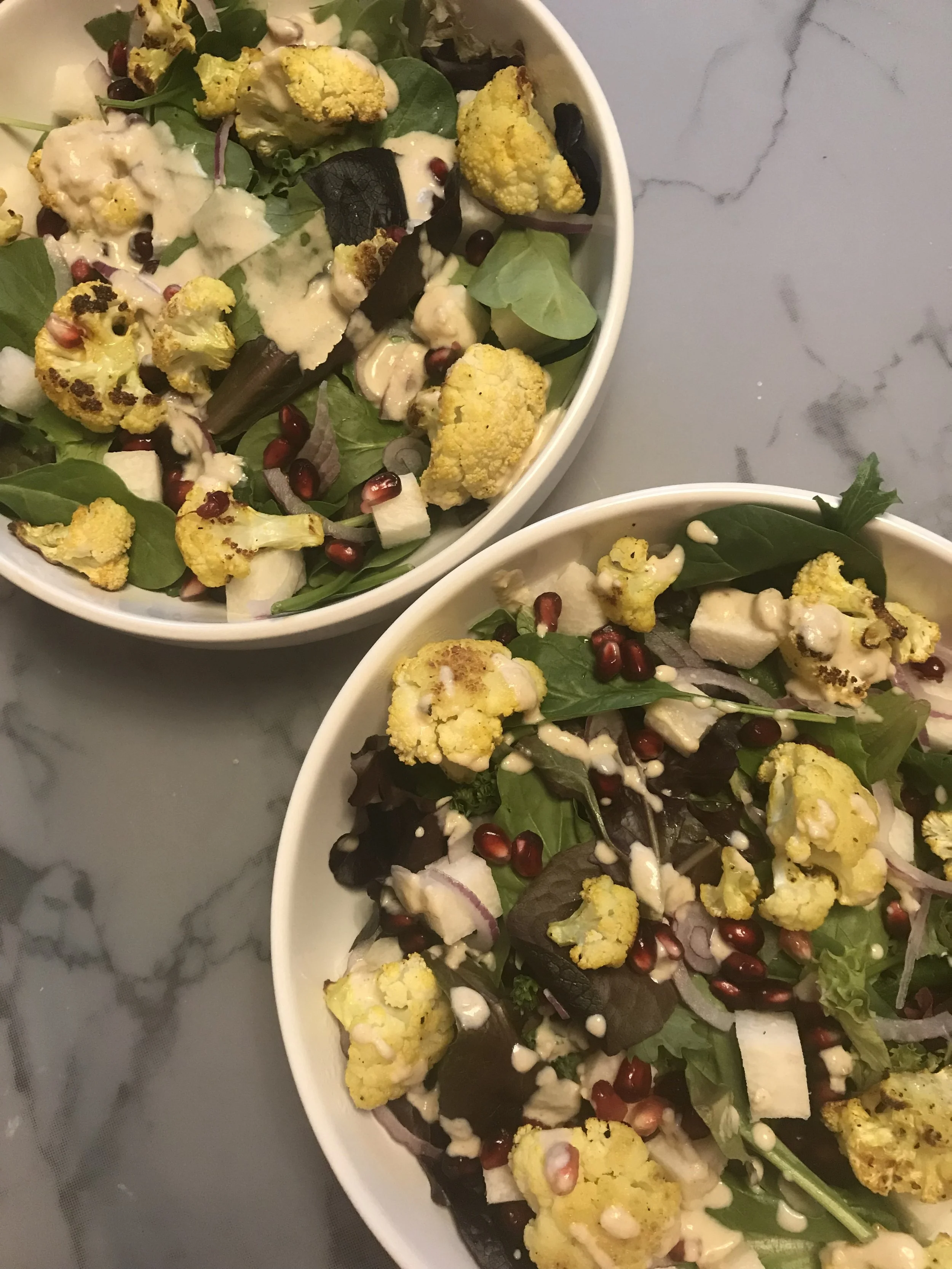 Turmeric Cauliflower Salad with Pomegranates and Lemon Tahini Dressing