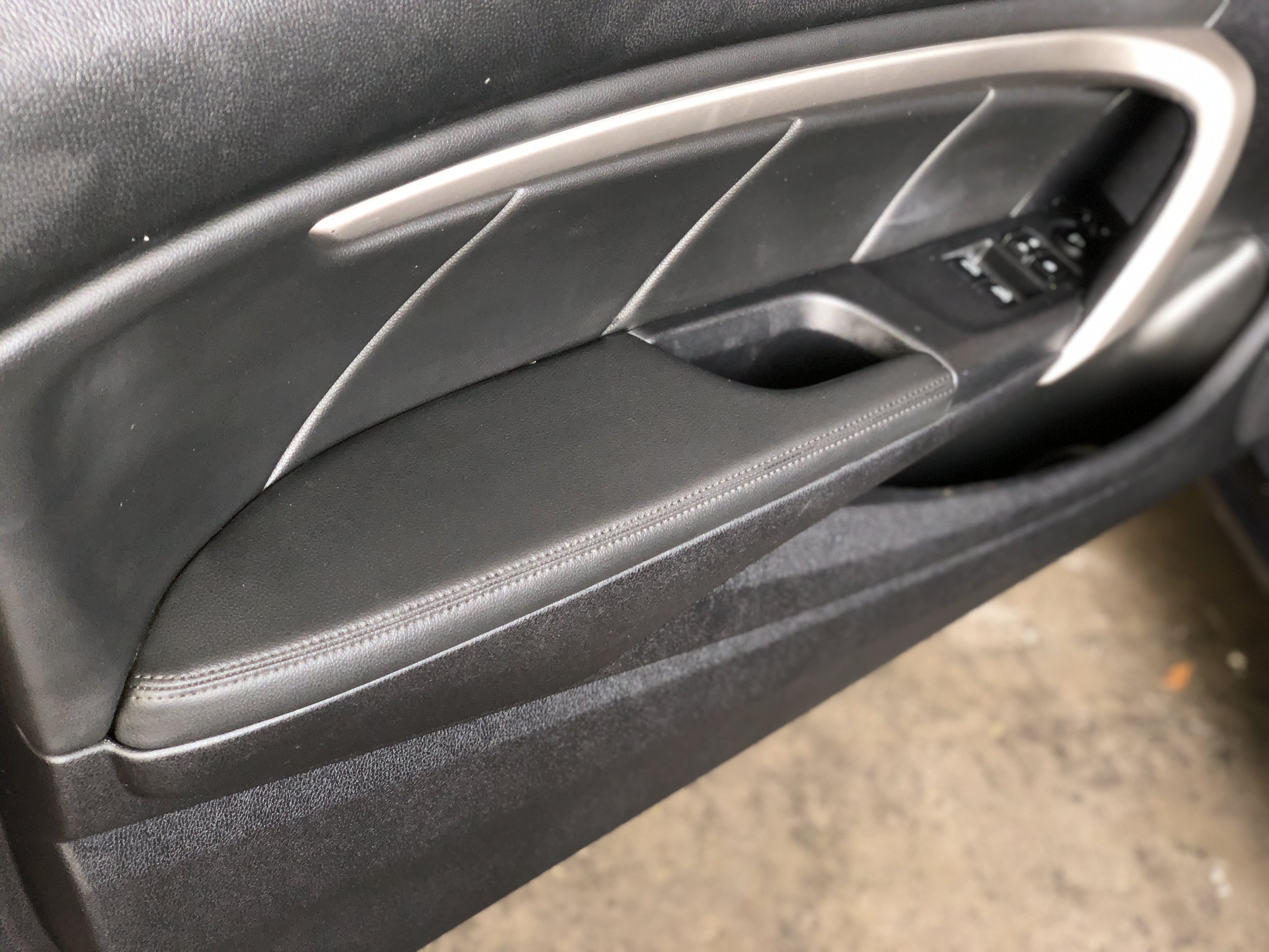 Door panel upholstery repair — Ted and Son Custom Upholstery Inc