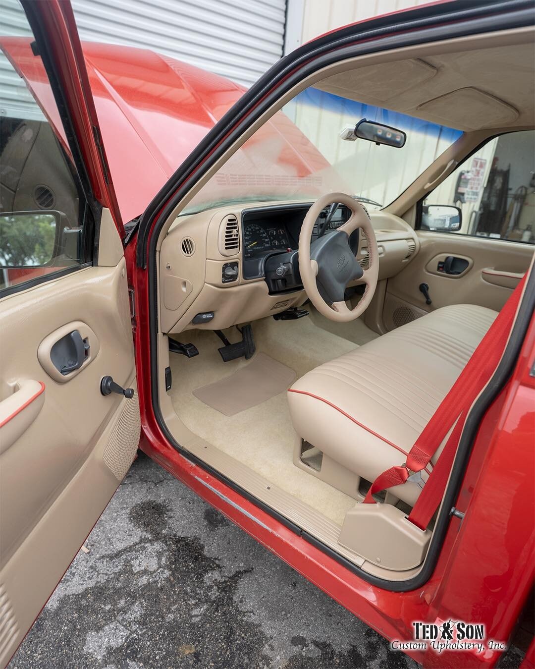 Check out the full interior transformation in this beautiful 1995 Chevy 3500. 
She got a leather steering wheel, a premium vinyl bench seat, suede headliner and visors, new fire red seat belts, new carpet with all plastics painted to match. 

At Ted 