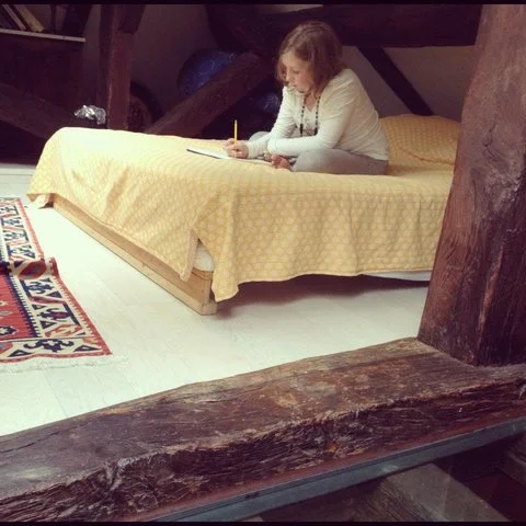 We just arrived in Paris, and Abigail is already sketching dragons.