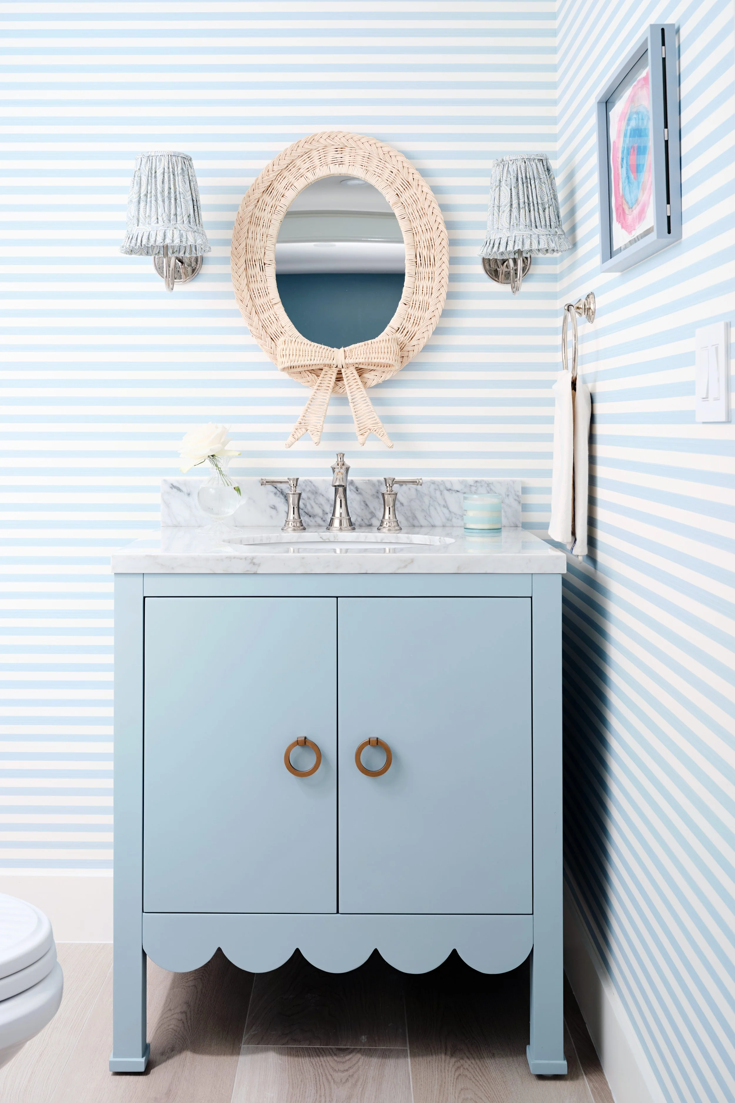palm-beach-condo-renovation-whitney-ross-blue-stripe-wallpaper-scalloped-vanity-bathroom.jpg