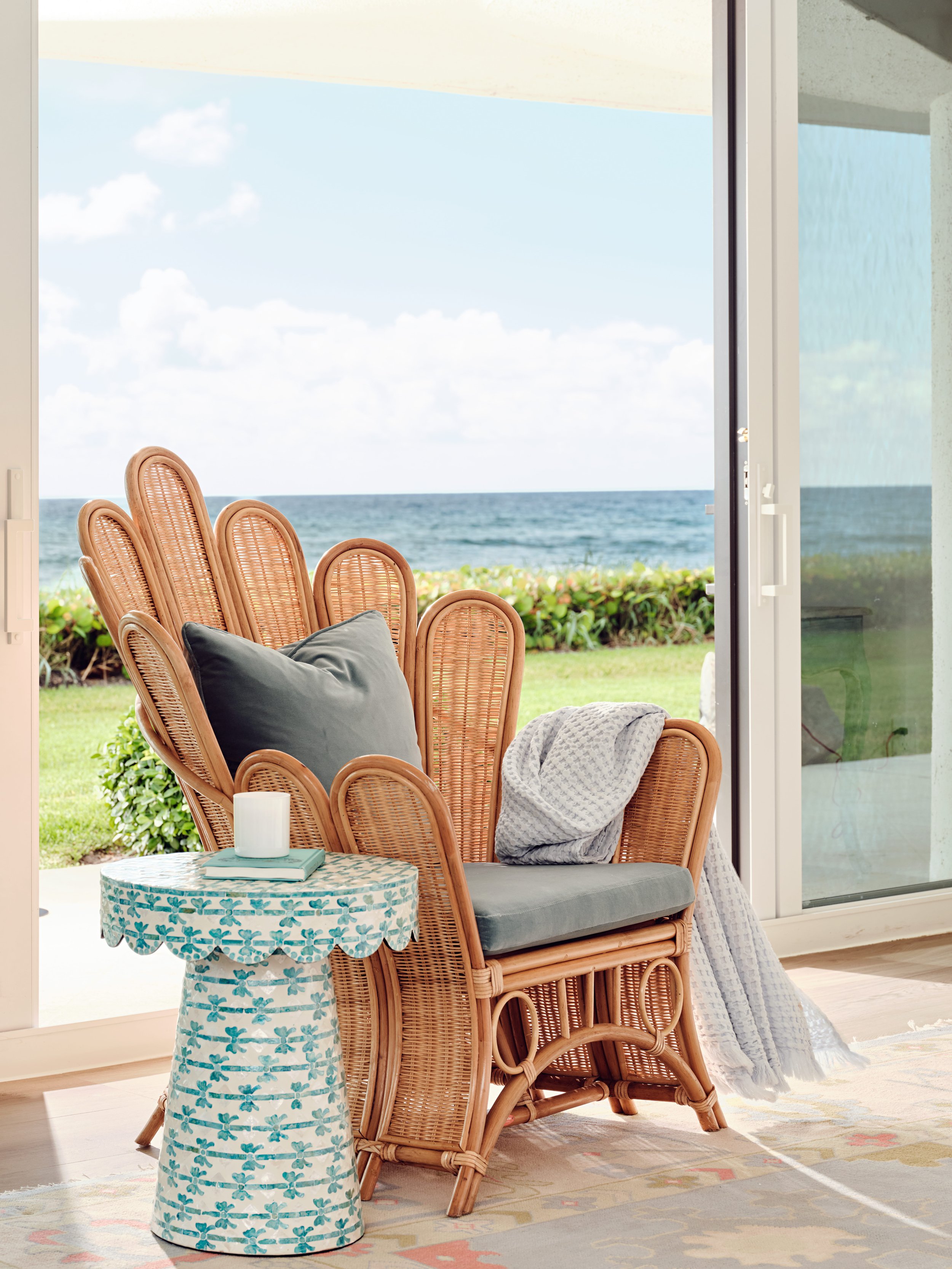 palm-beach-condo-renovation-whitney-ross-boho-chair-rattan-ocean.jpg