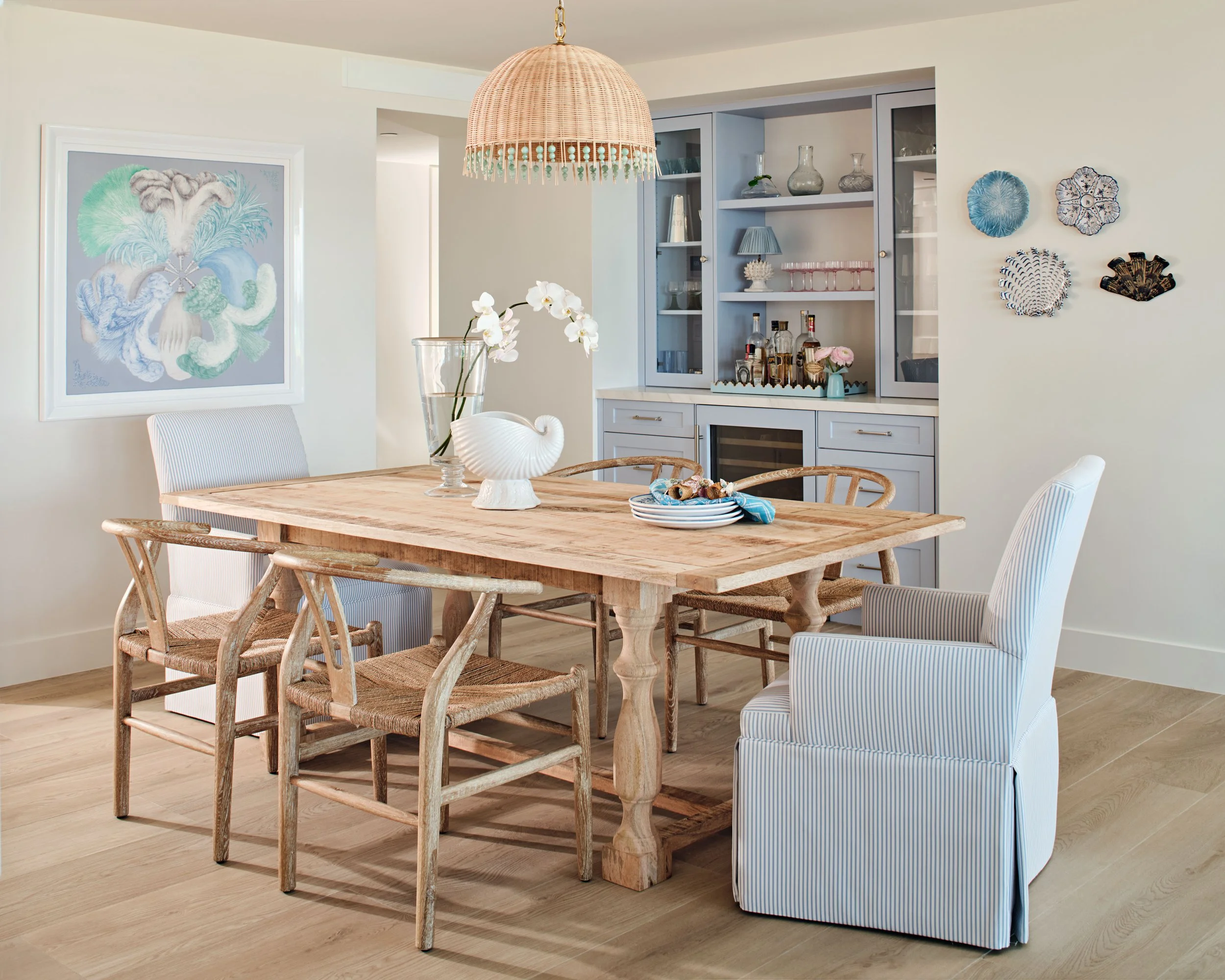 palm-beach-condo-renovation-whitney-ross-dinning-room-coastal-transitional-wood-table.jpg