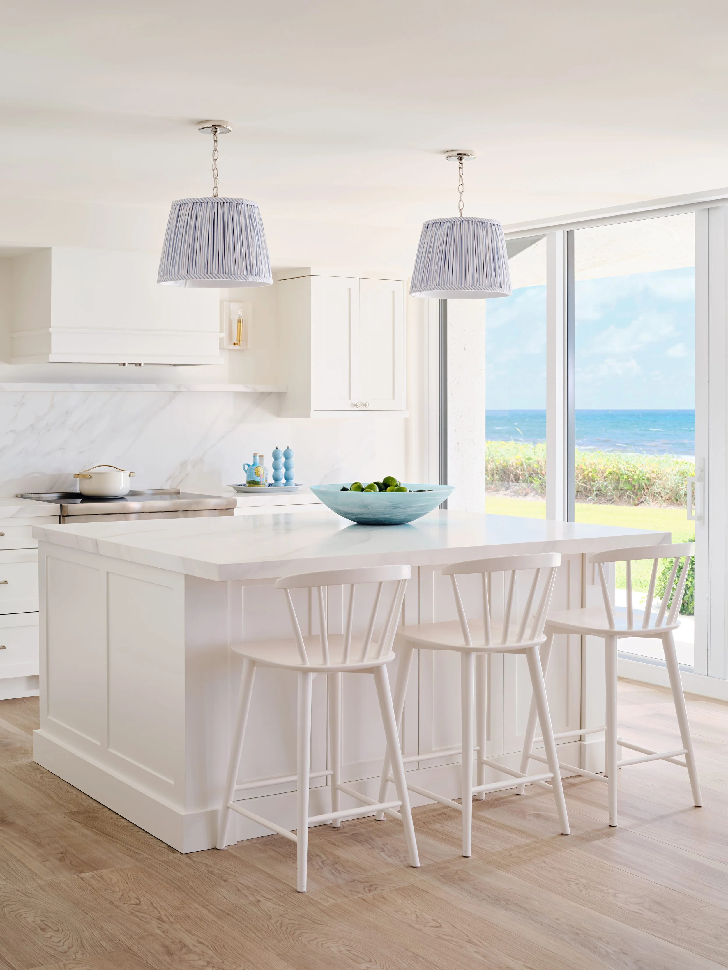 palm-beach-condo-renovation-whitney-ross-kitchen-white-coastal-ocean.jpg