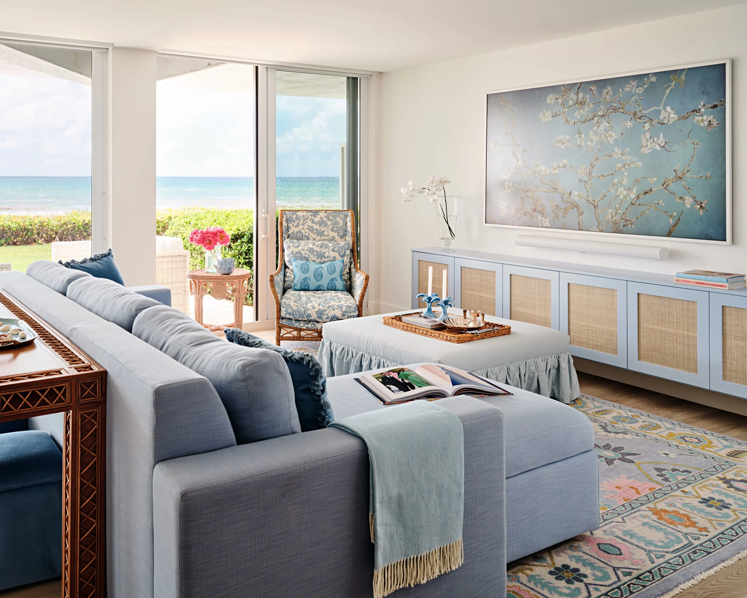 palm-beach-condo-renovation-whitney-ross-living-room-coastal-ocean-blue-couch.jpg