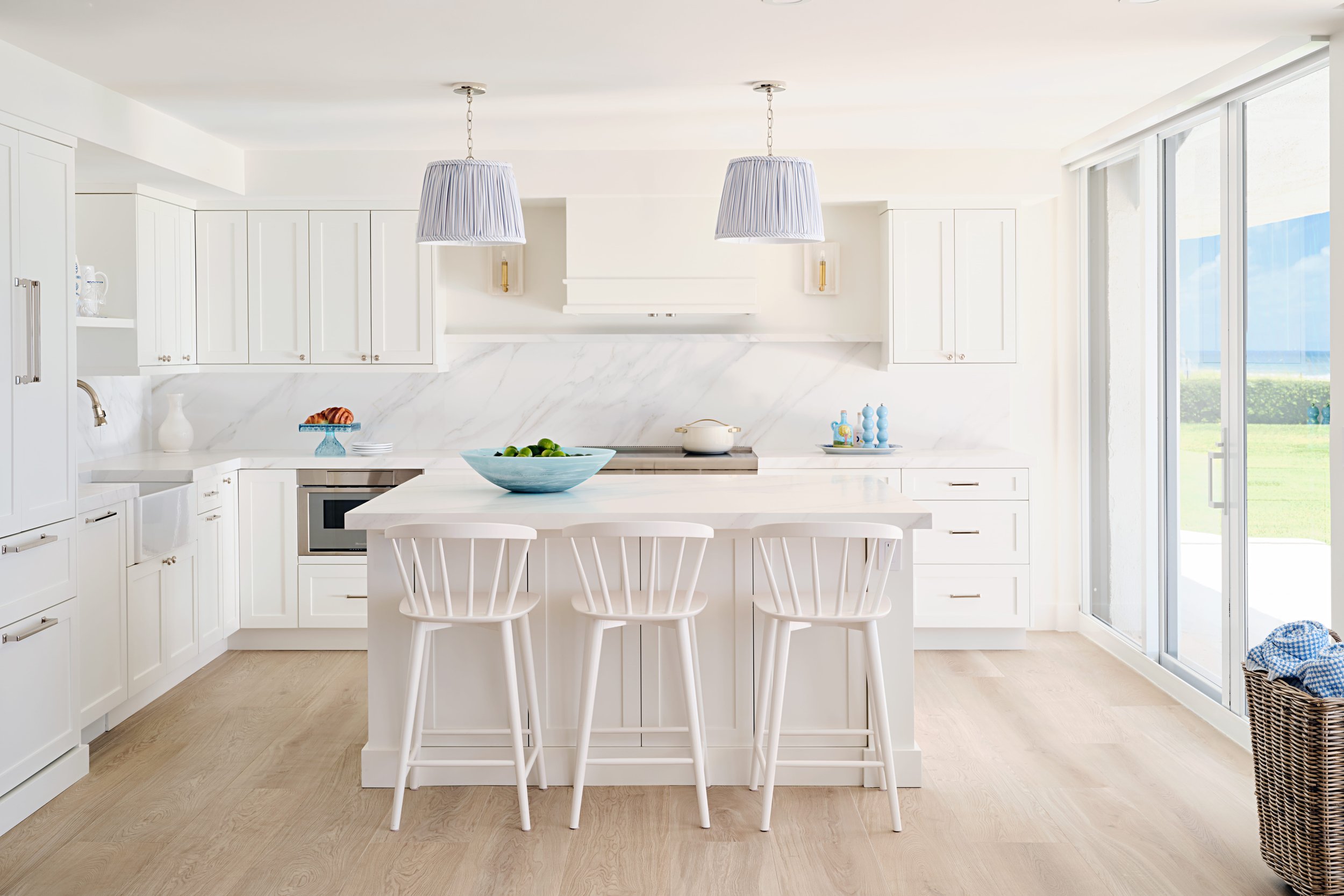 palm-beach-condo-renovation-whitney-ross-ocean-coastal-white-kitchen.jpg