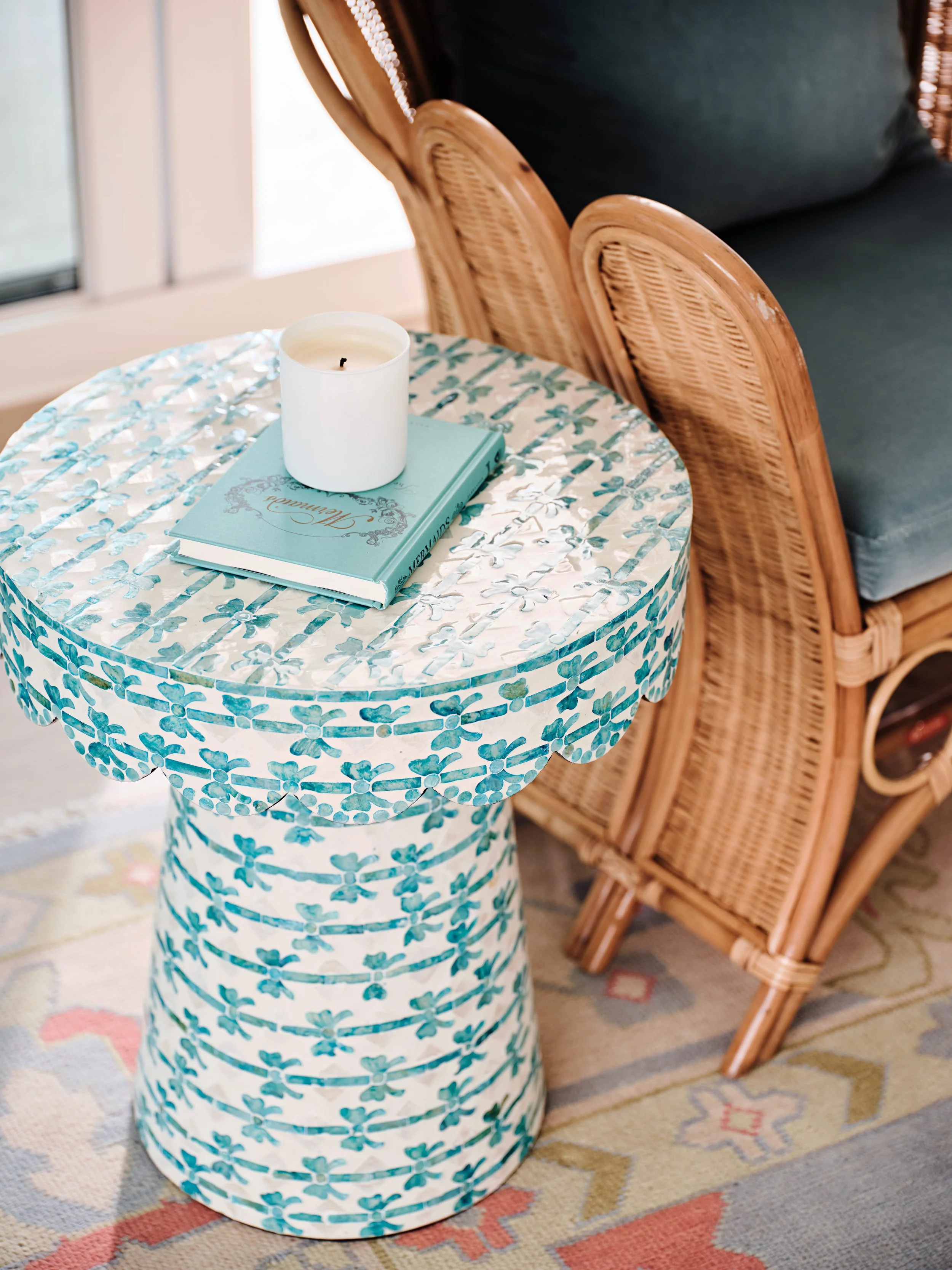 palm-beach-condo-renovation-whitney-ross-palm-coastal-side-table-rattan-chair.jpg