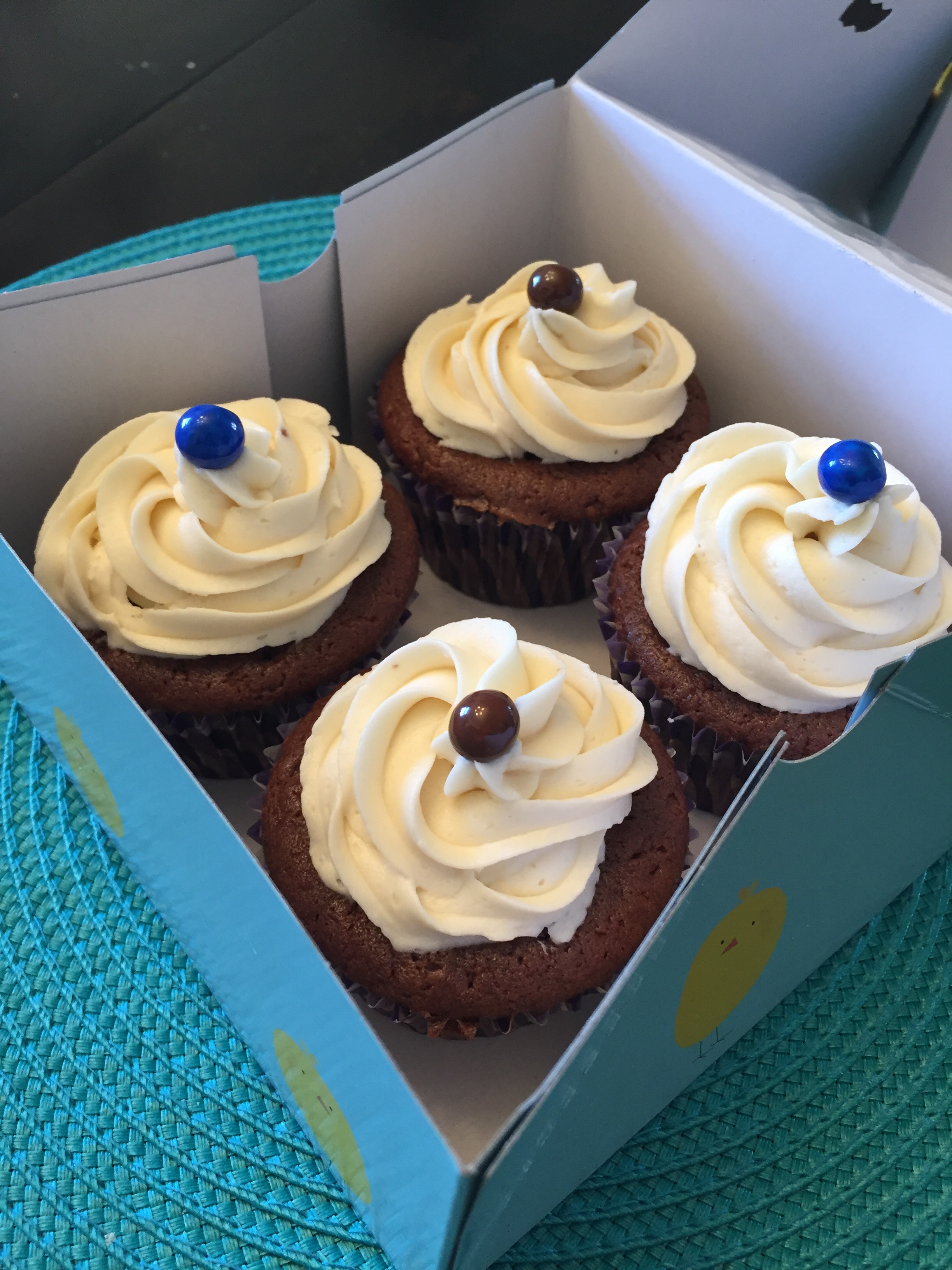   Chocolate cupcakes with vanilla buttercream frosting :  This cupcake is my favorite indulgence.&nbsp; The perfect bounce and texture and balanced with the vanilla buttercream 'softserve' design with sixlet topper.&nbsp; Always peanut, tree nut, and