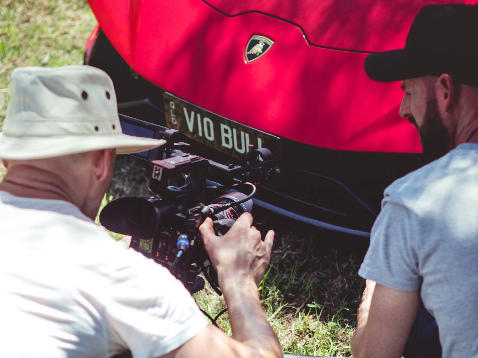 Filming a car review.