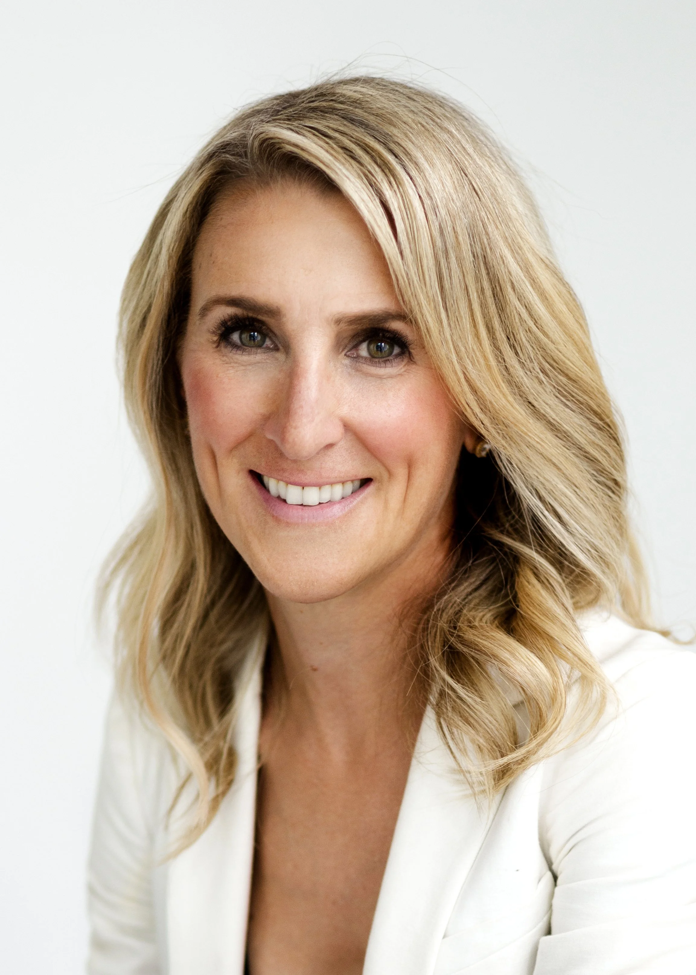 Official headshot of Sarabeth Berk Bickerton wearing a white blazer