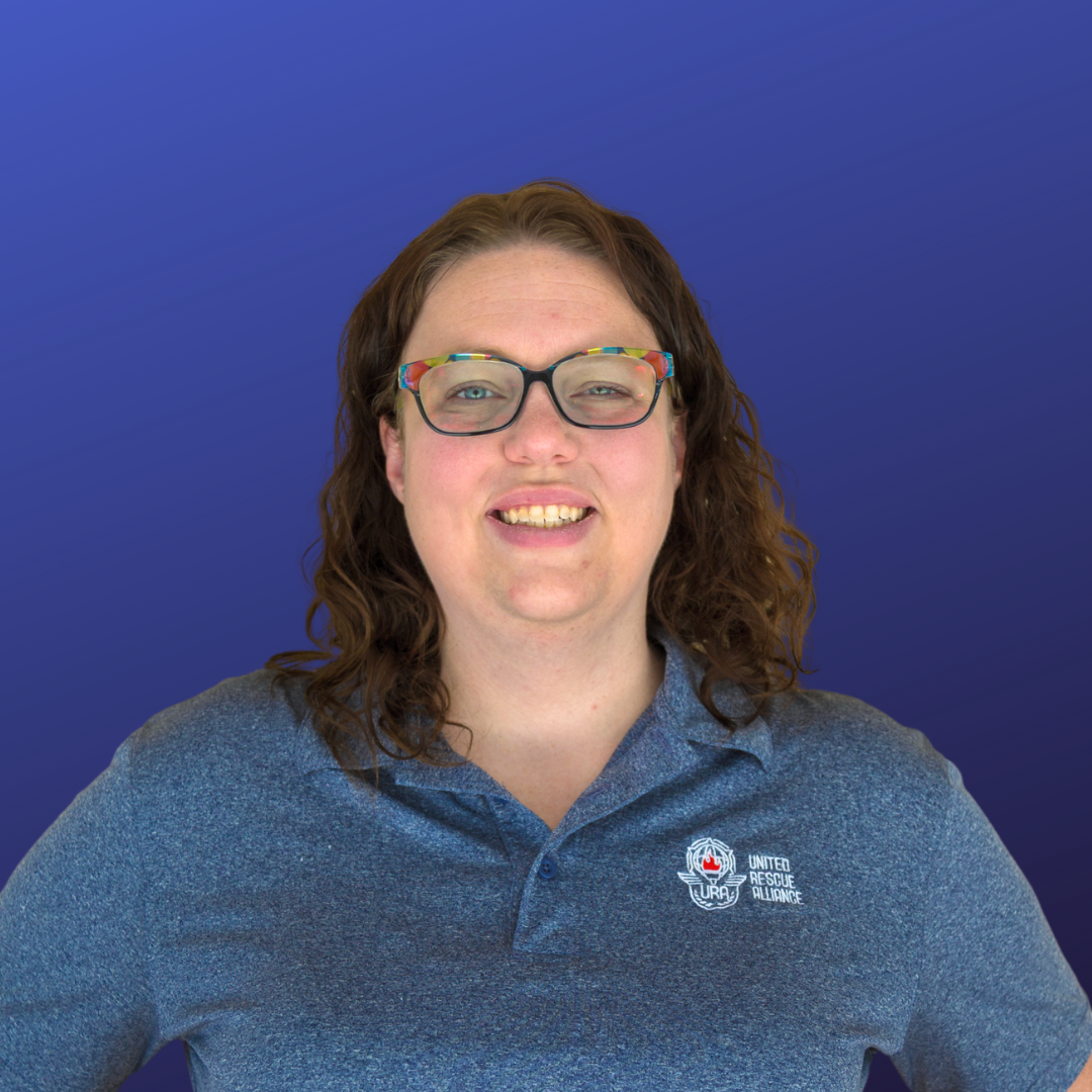 A circular stamp with the words 'COMING SOON' repeated three times and a red diagonal banner with 'COMING SOON' in white letters across the center.