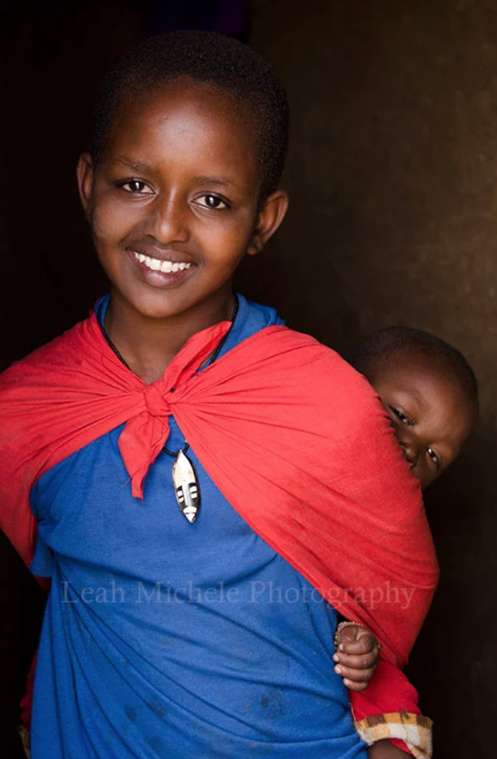 Young Girl With Baby