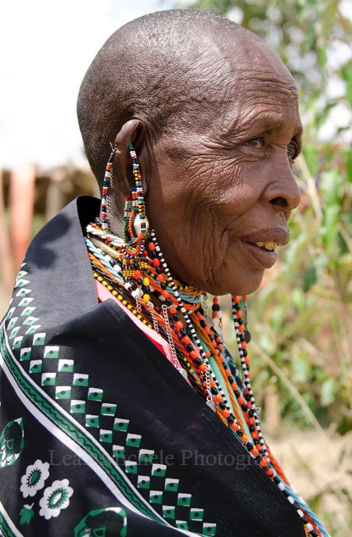 Elder With Blue Scarf In Profile