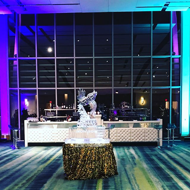 Masquerade ball for Corporate Party @gaylordnational with dazzling linens, fun mask center pieces, branded ice carving, casino &amp; cool cosmo bar! #corporateparties #masqueradeball #nationalharbor #corporateevents #masqueradetheme #osborneevents