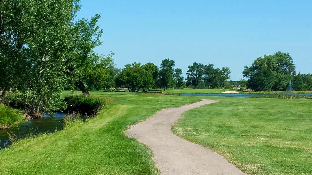 Need to hit the ball between the river and the lake - pretty hard.