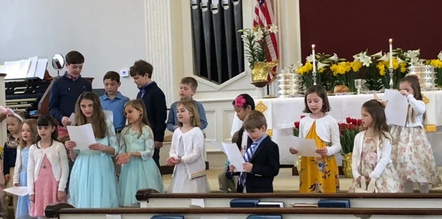 Children singing during the worship.