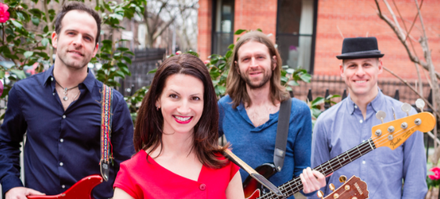 thumbnail_Suzy Shelton standing band.png