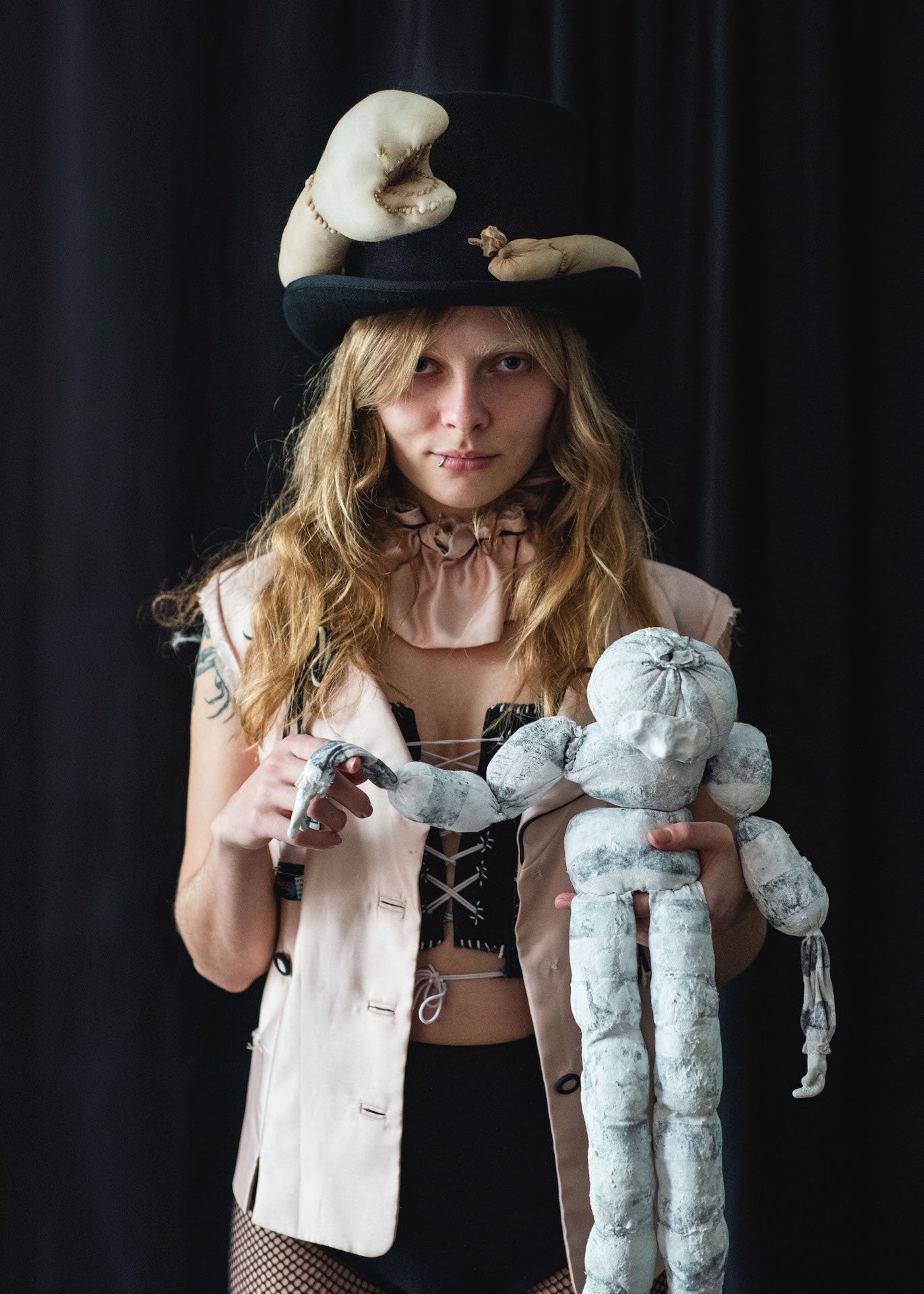  Eleanor with her puppets “Residual Shame”  &amp; “Hung” 