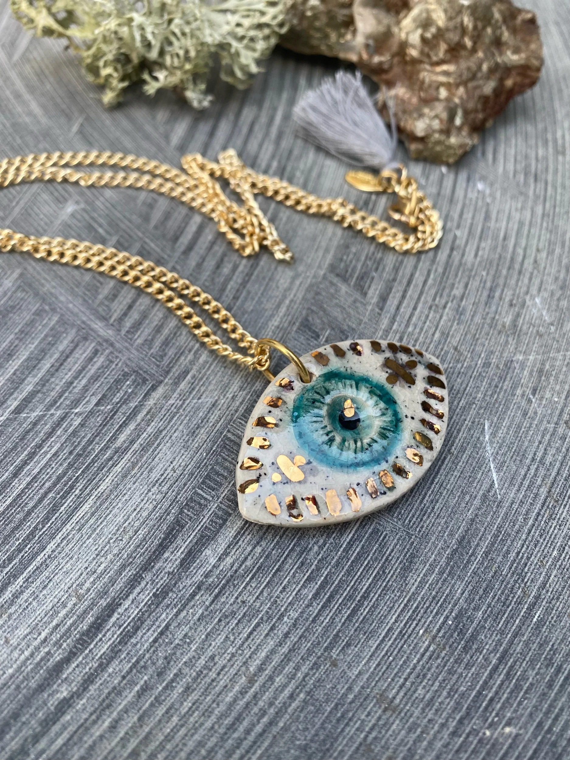 Ceramic magic Blue eye gold necklace