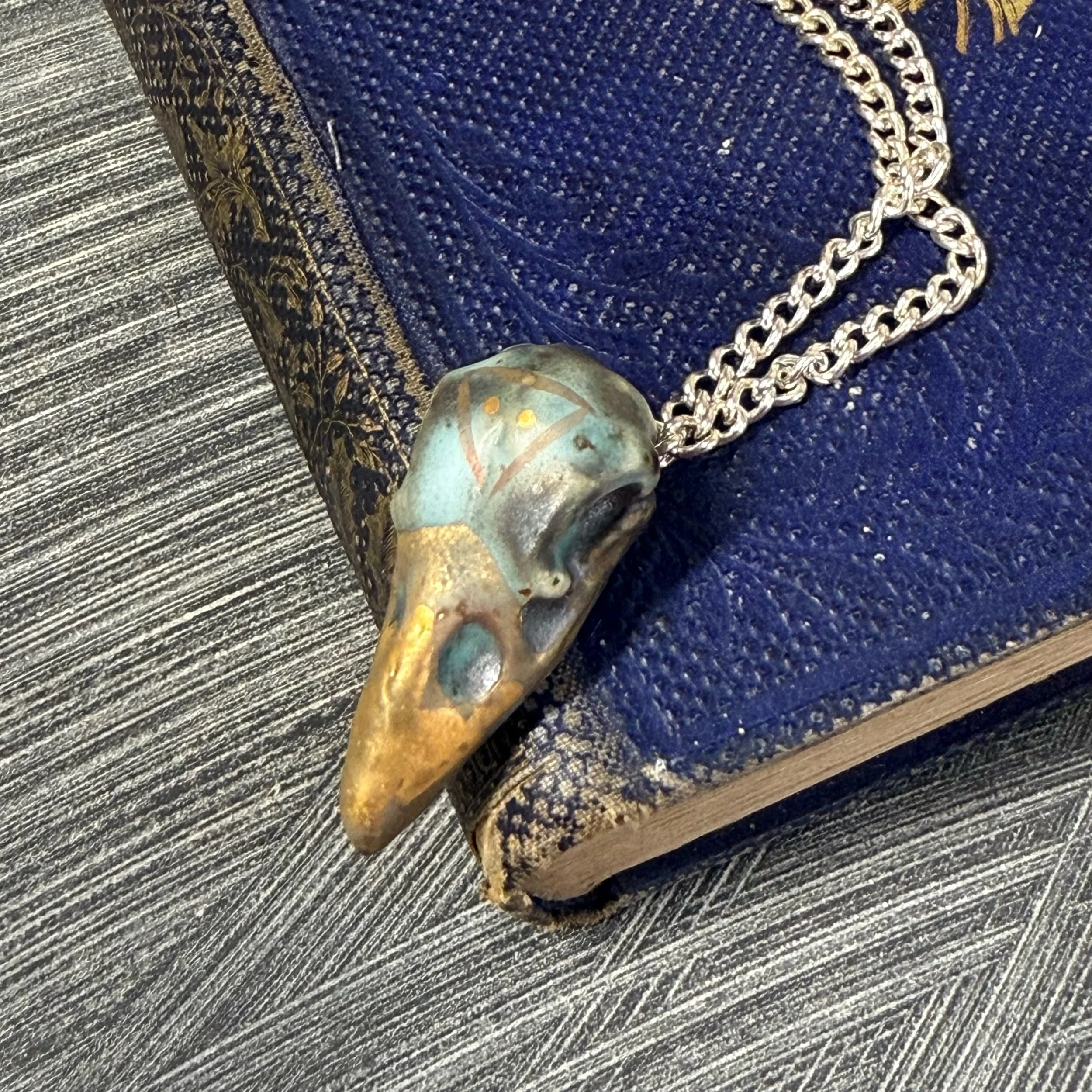 Grounding ceramic Raven skull necklace