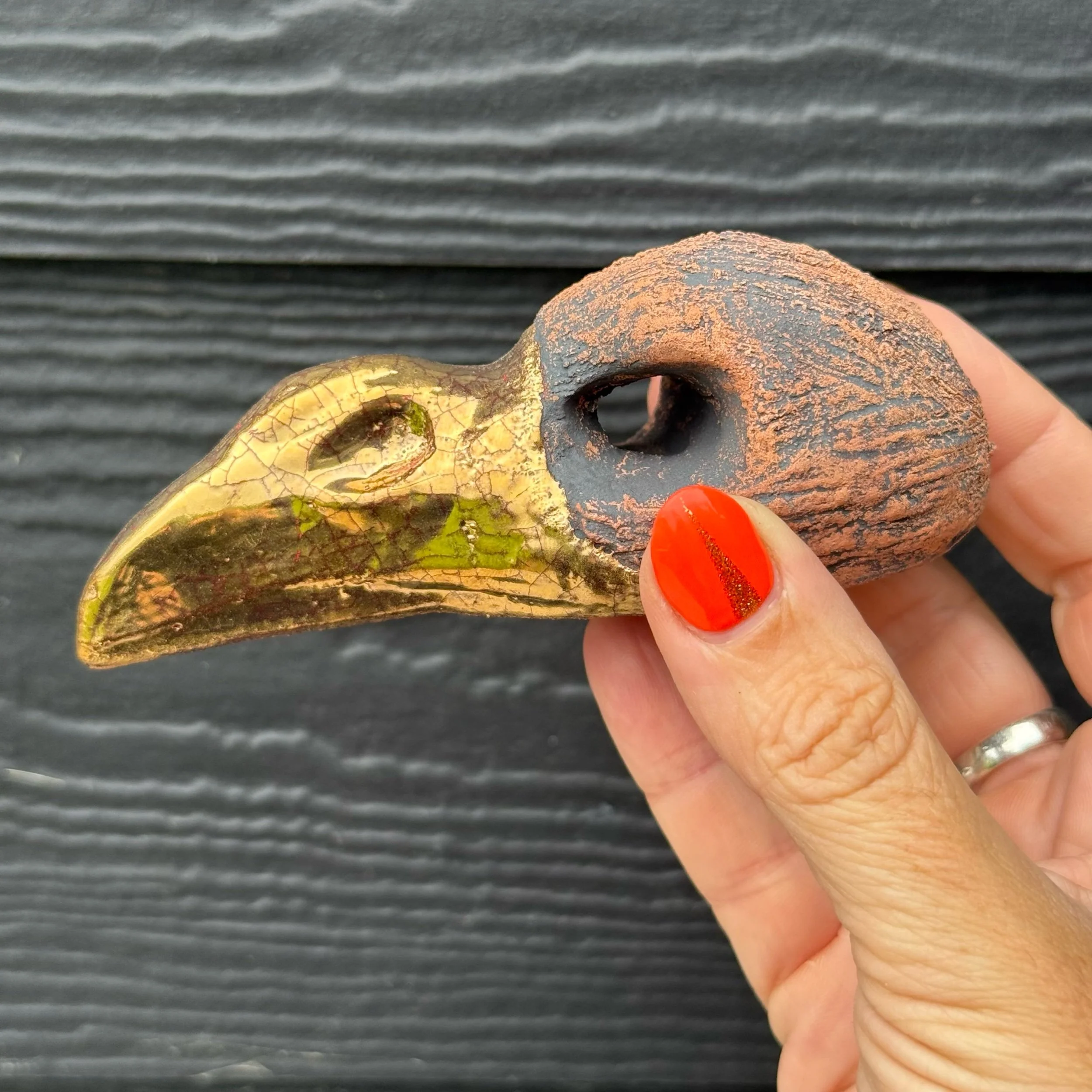 Golden Whisper – Ceramic Raven Skull Sculpture (Medium)