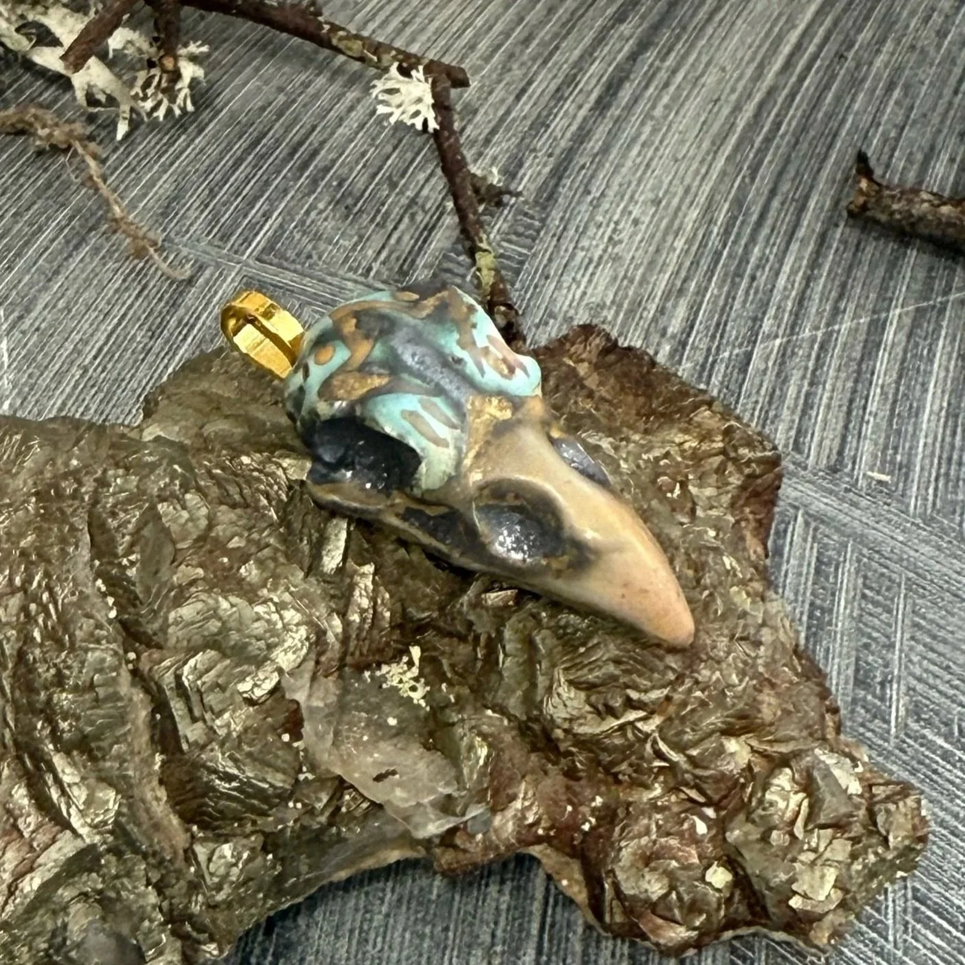 Ceramic raven skull talisman pendant