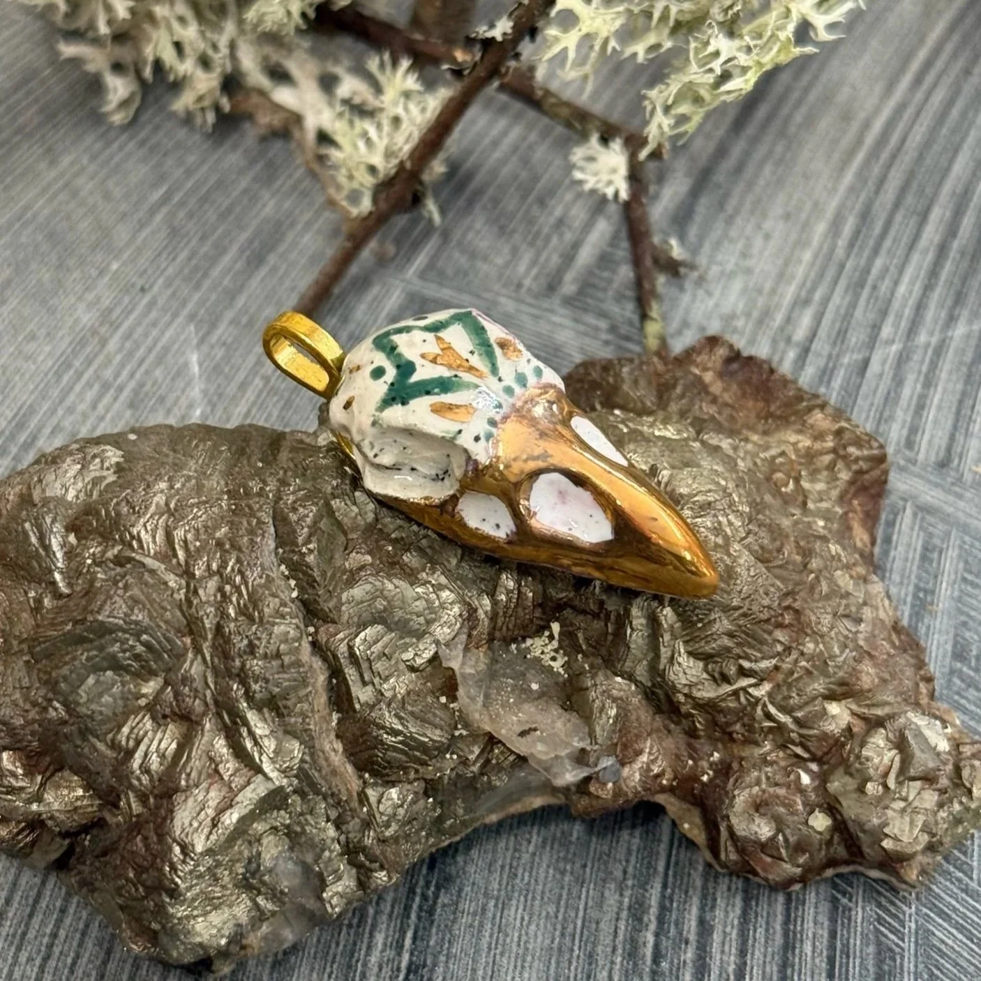 Ceramic raven skull talisman pendant