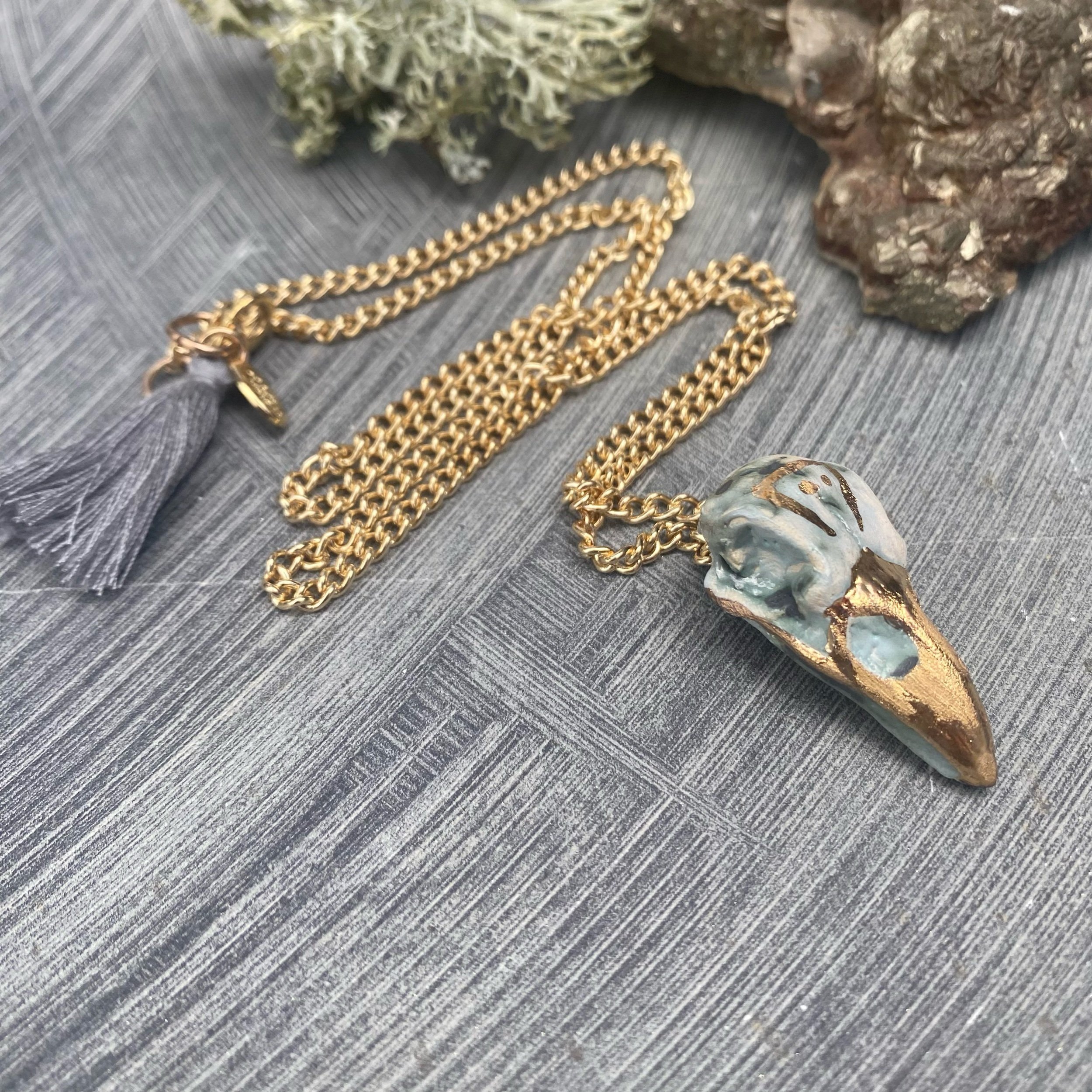 Grounding oxide ceramic Raven skull necklace