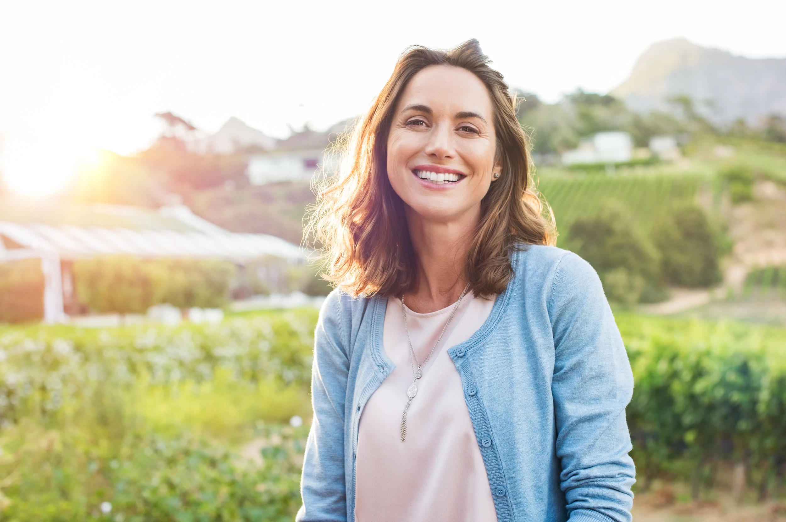Laughing-woman-in-park-658617510_6144x4080.jpeg