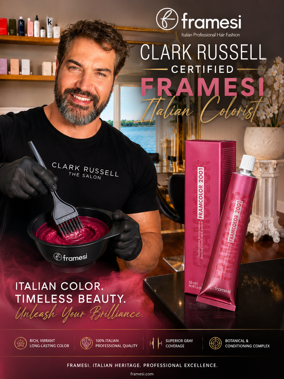 A man with a beard holding a bowl of vibrant pink hair color, wearing a black T-shirt with 'Clark Russell The Salon' printed on it, standing in a well-lit hair salon. In the background, shelves with hair products, a vase with white flowers, and a window overlooking a body of water are visible. The promotional poster advertises Framesi Italian hair color, featuring the product box and tube labeled 'Framesi Color 2001', with text highlighting the product's long-lasting, vivid color, Italian quality, superior gray coverage, and botanical conditioning.