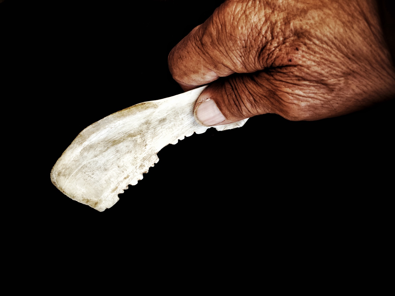 Deer Bone Blade in Grandfather's Hand