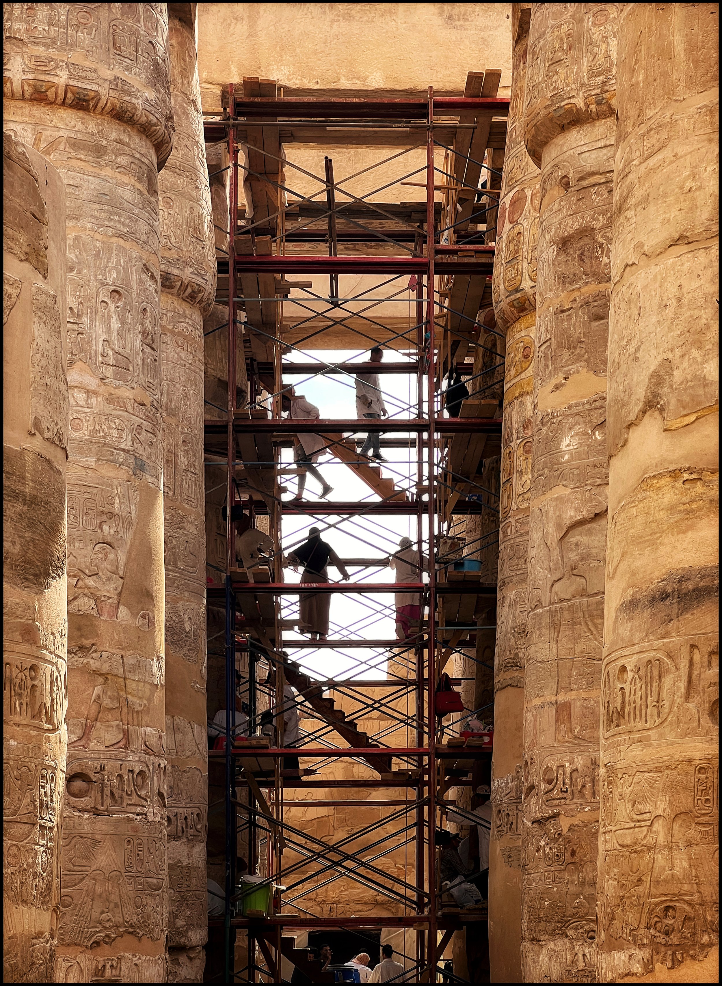  Workers restore the Temple of Karnak. The Gods are under renovation. 