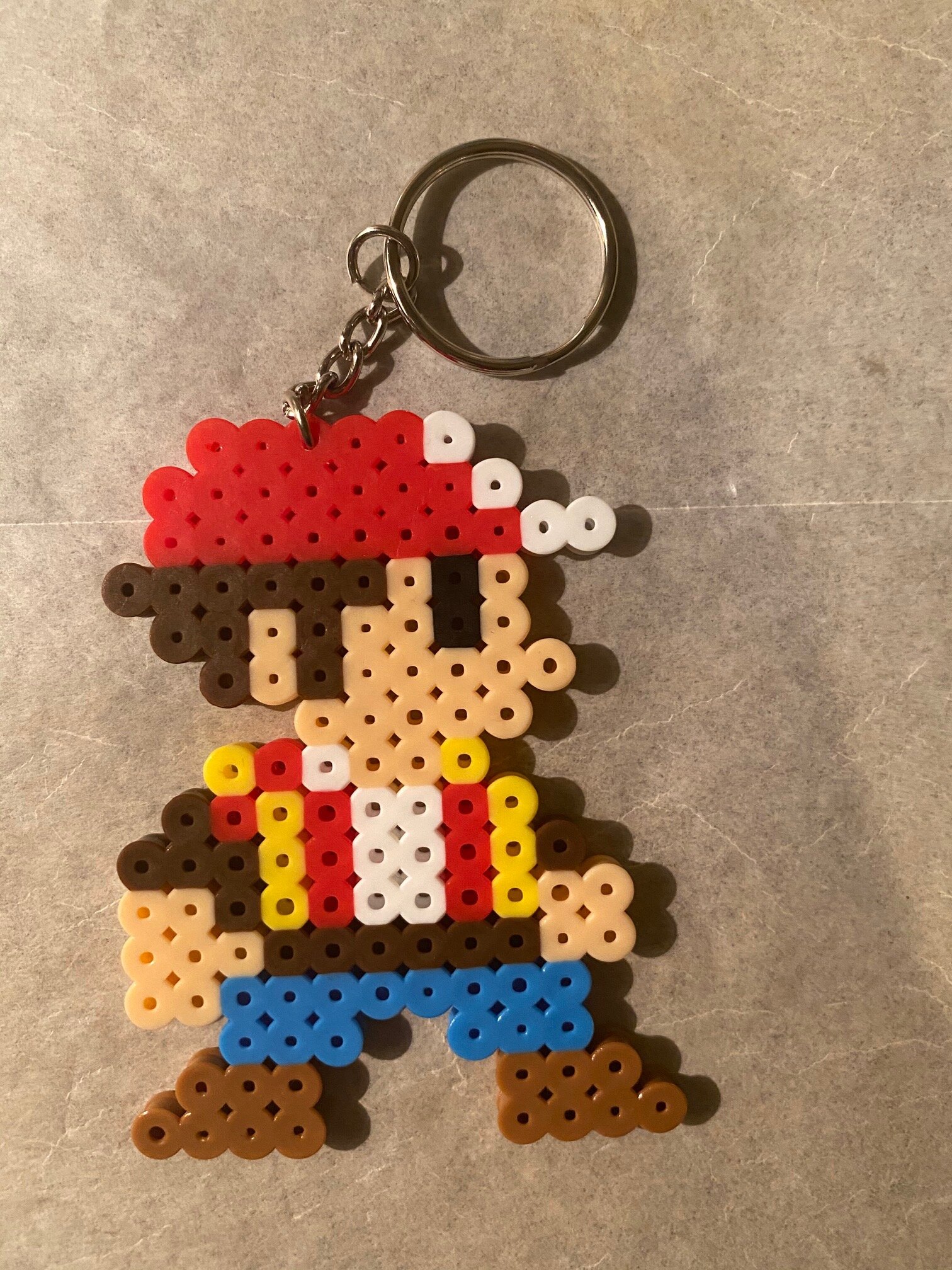Pokemon trainer bead keychain