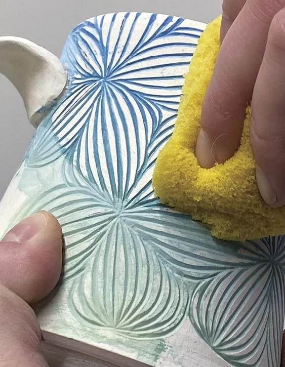 sgrafitto and carving