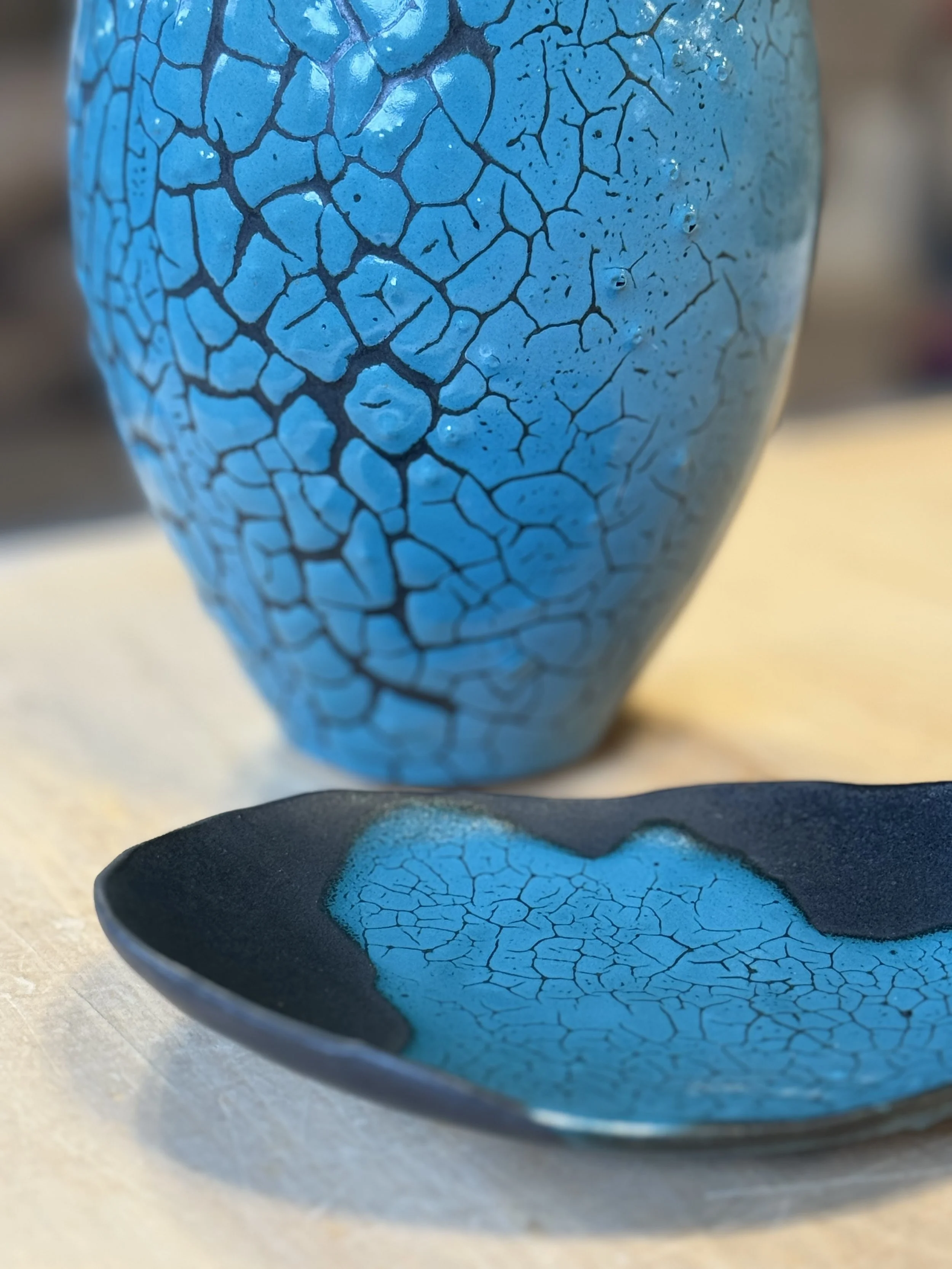 Teal crawl over black