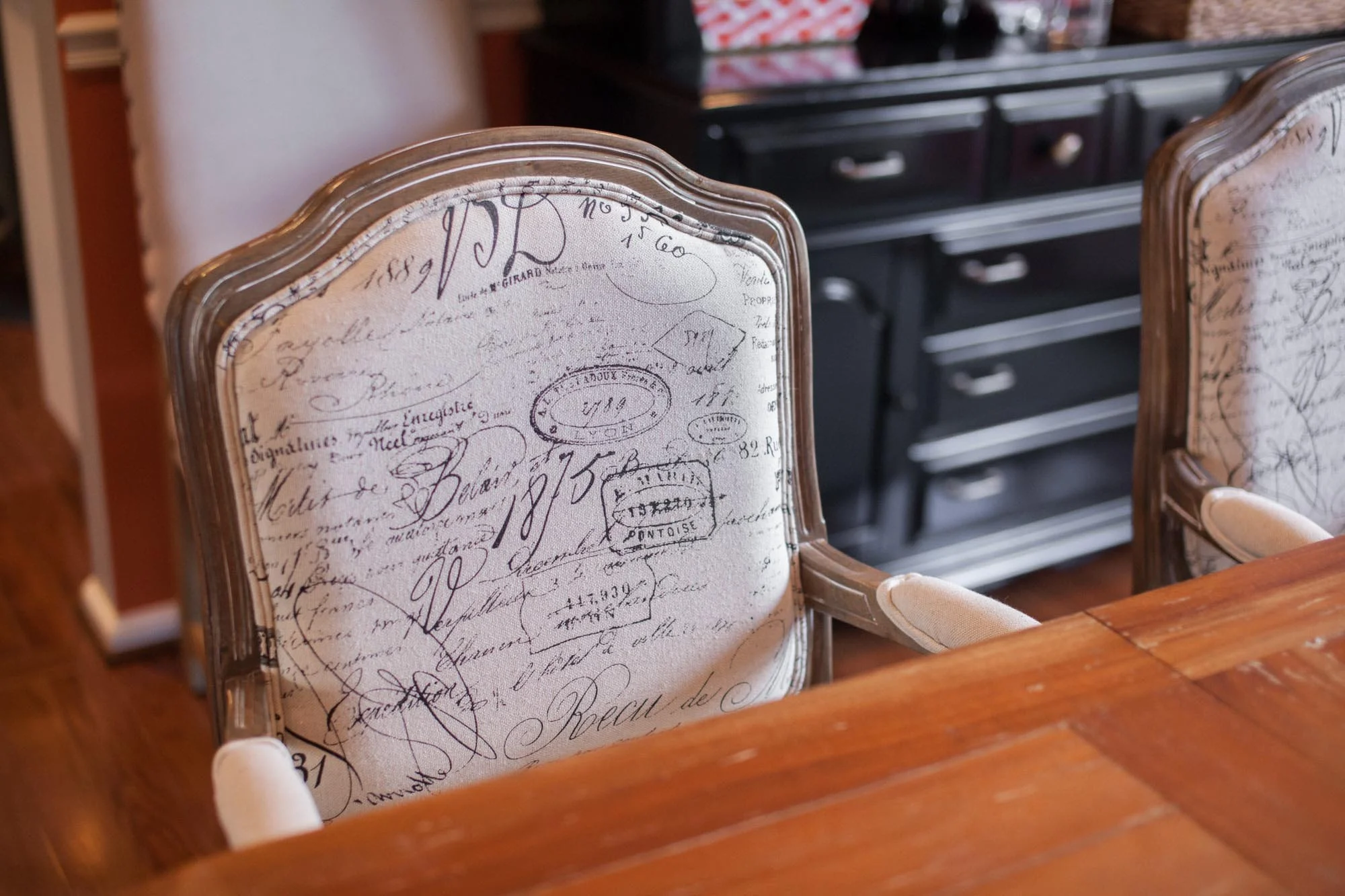 Decorative chair along wooden table