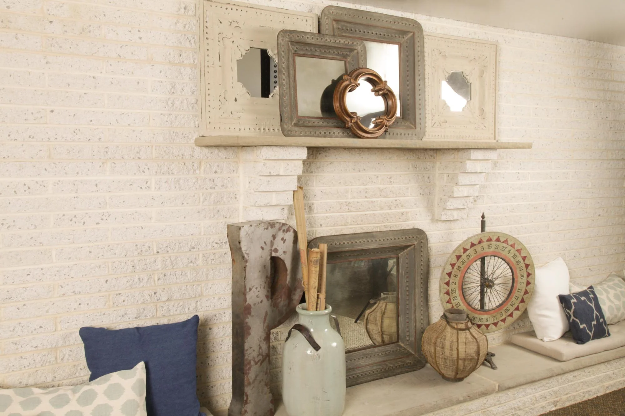 Fireplace and mantle with pillows and accessories