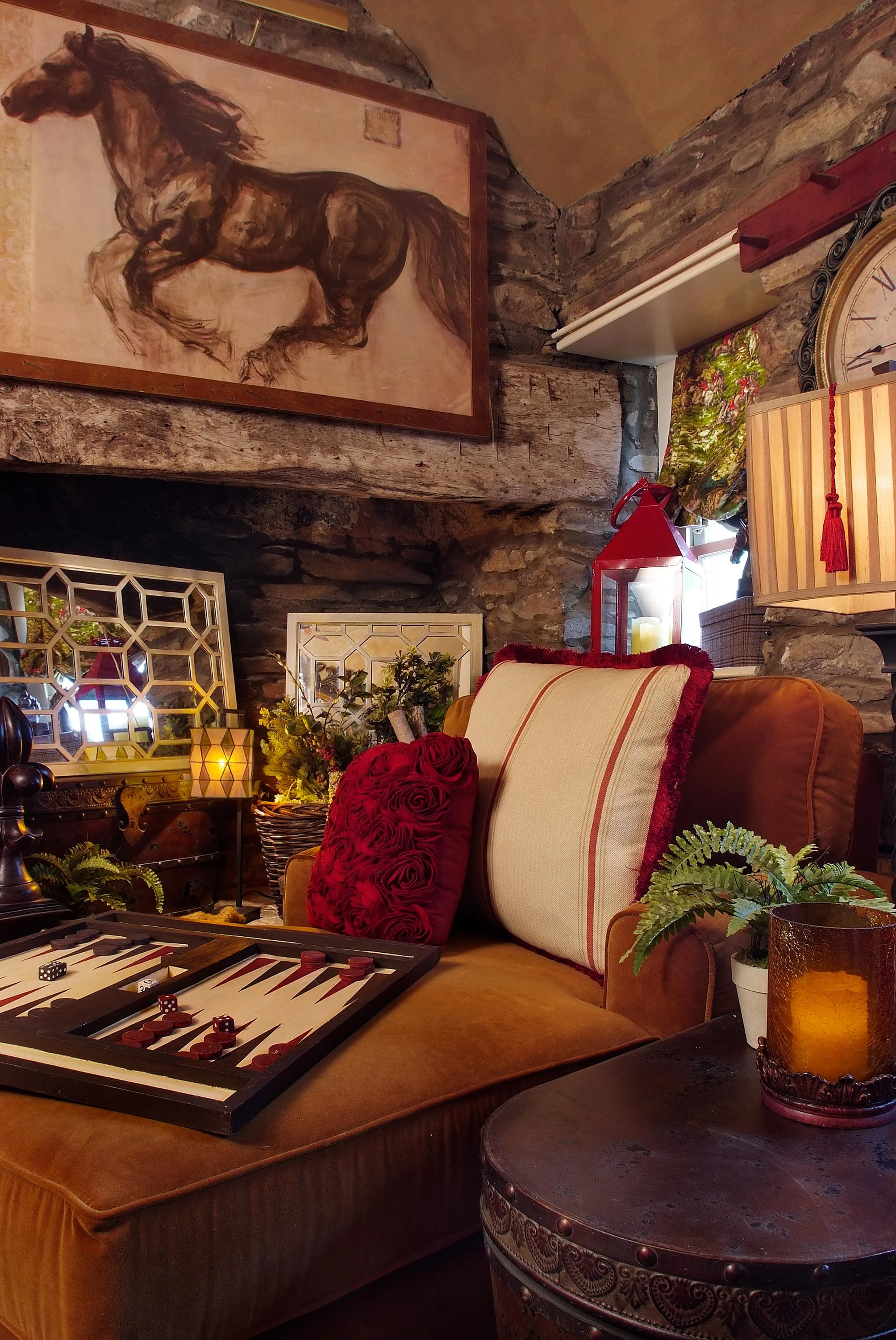Stone fire place and mantel with soft seating