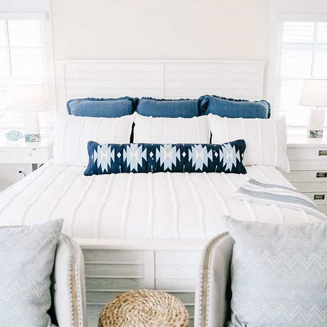 I kept this beach house bedroom feeling bright and airy by keeping the palette neutral and bringing in one statement piece. This lumbar pillow is a bold statement, but easy to update over the years as the home owner's style changes! ✨

Do you guys wa