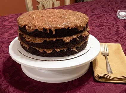 Firefly_Gemini Flash_Put this cake on a table with a nice table cloth.   796886.jpg