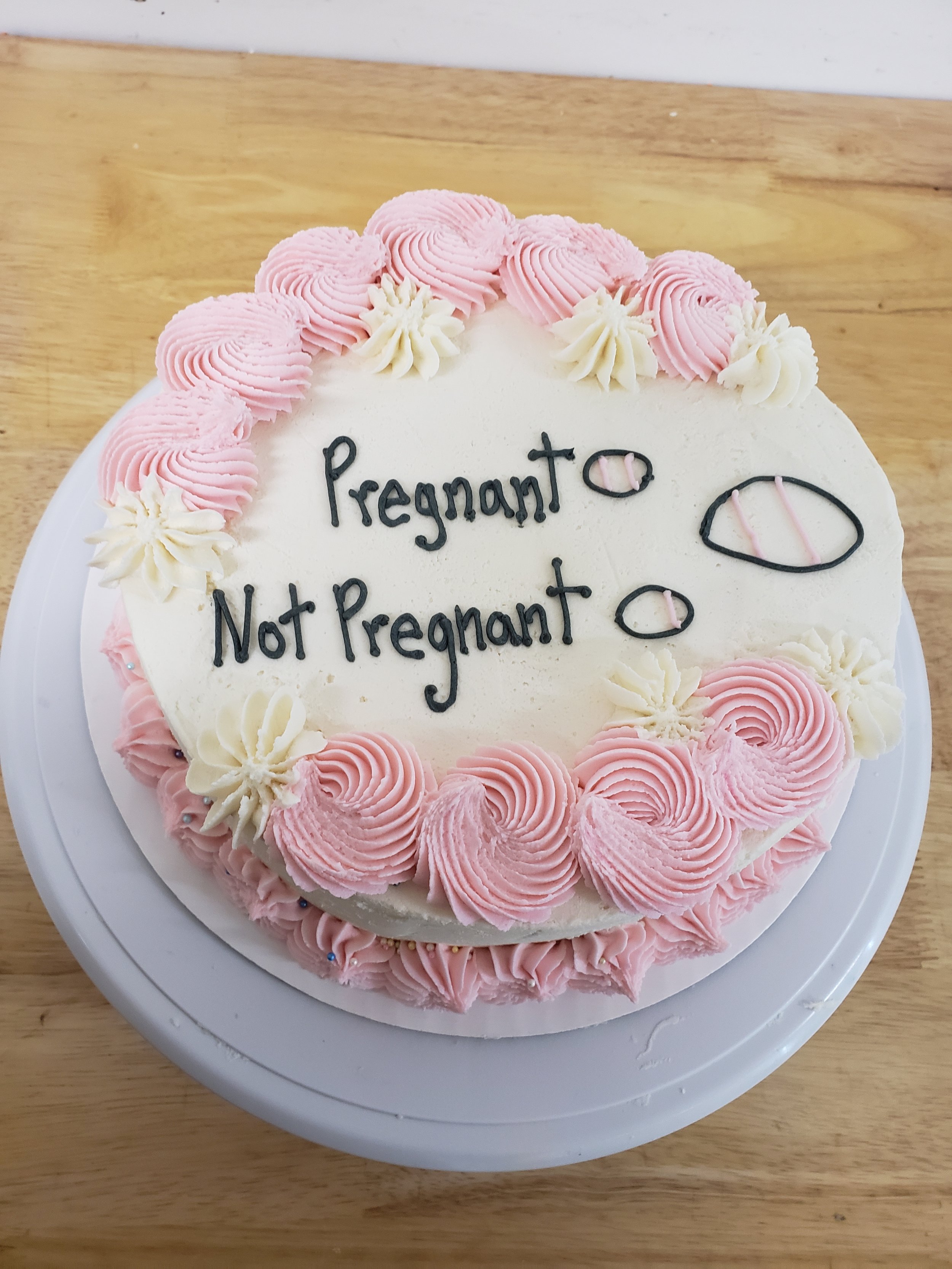 pregnancy announcement cake