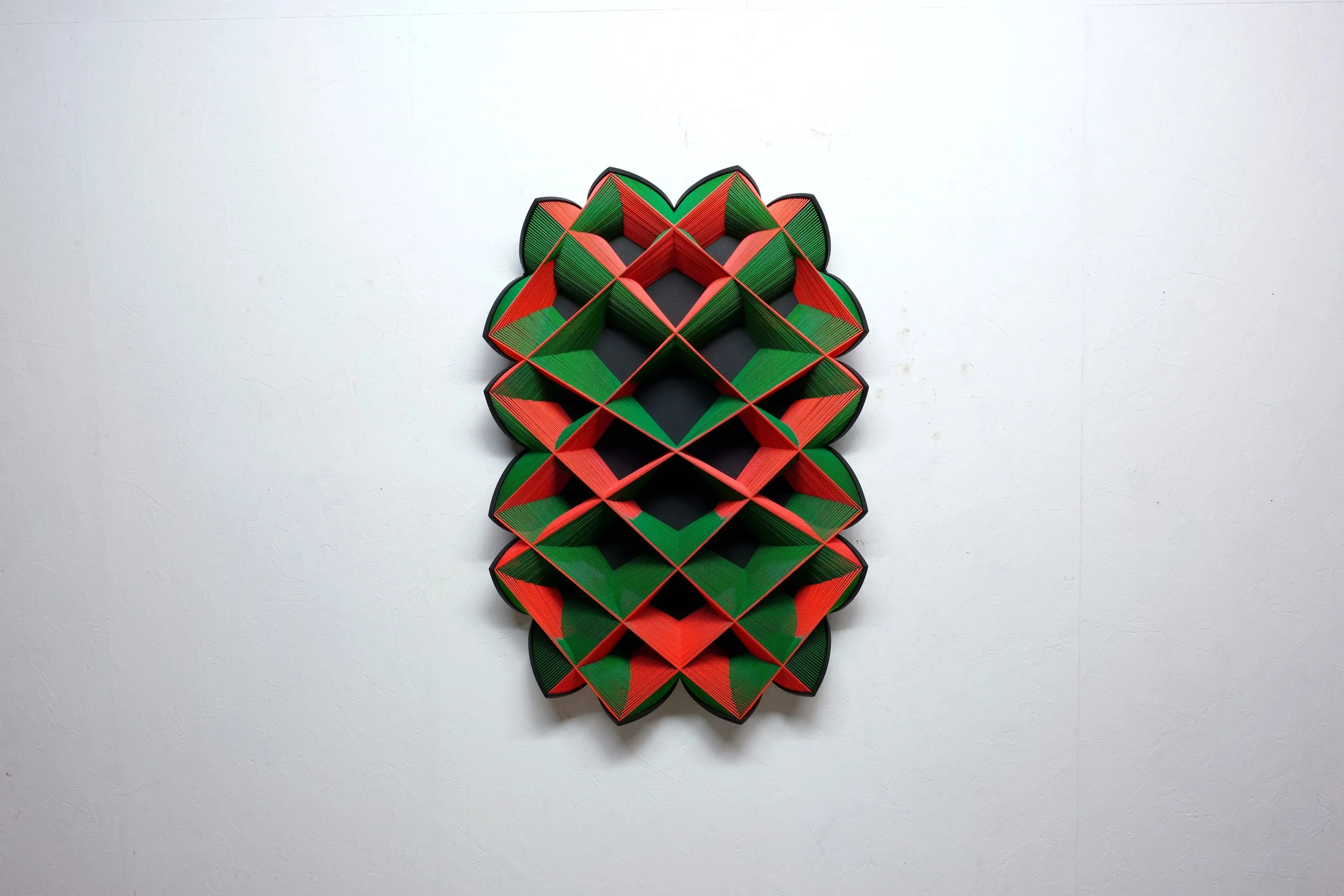   Evo  1, 2024, 101x69x13 cm, 39.7x27.1x5.1 in, cotton, wood, staples, paint 