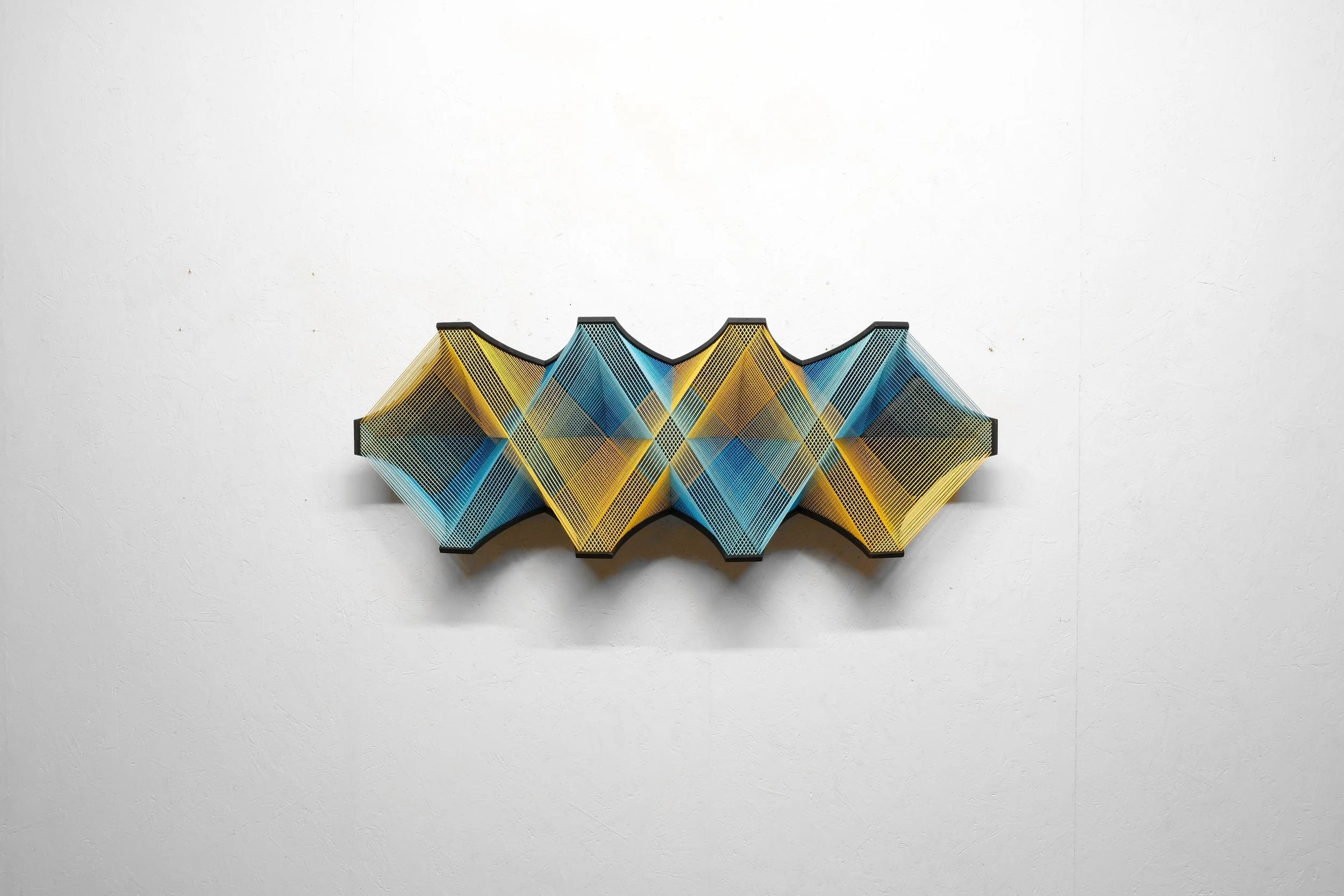   Ghosts   2,  2024, 37x104x22cm 14.6x41x8.6in, cotton, wood, staples, paint 